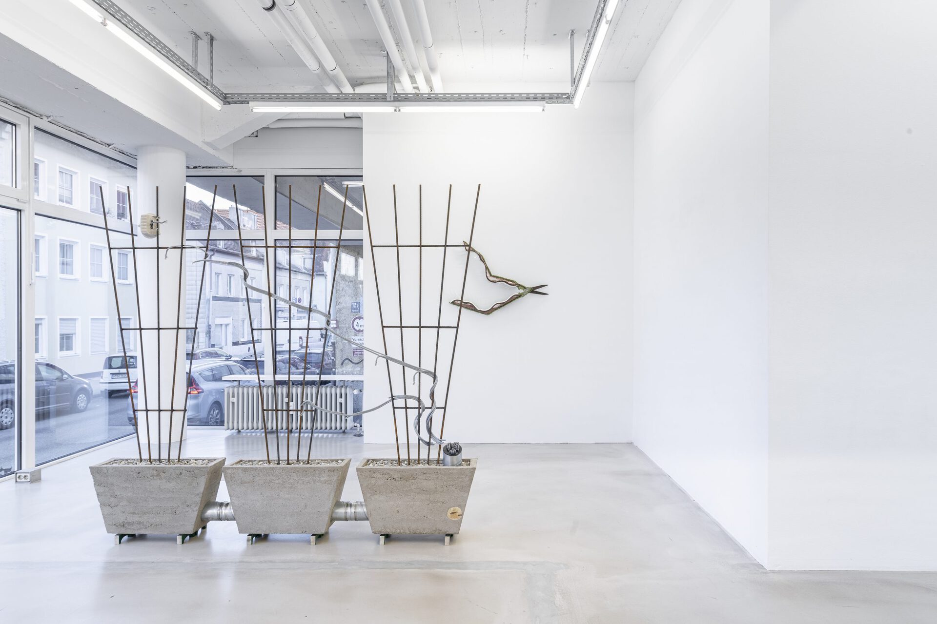 Josephine Baker - Versunkene Landschaft (Sunken Landscape) #1, 2022, cable, cable ties, concrete, concrete rubble, coral fragments, Dover chalk, epoxy resin, fossil fishes (Knight Alta, Eocene rock), paint, pine, plaster, plywood, rubber, security light, steel ducting, steel reinforcement bars, tube clips, 205.5x191.5x29 cm