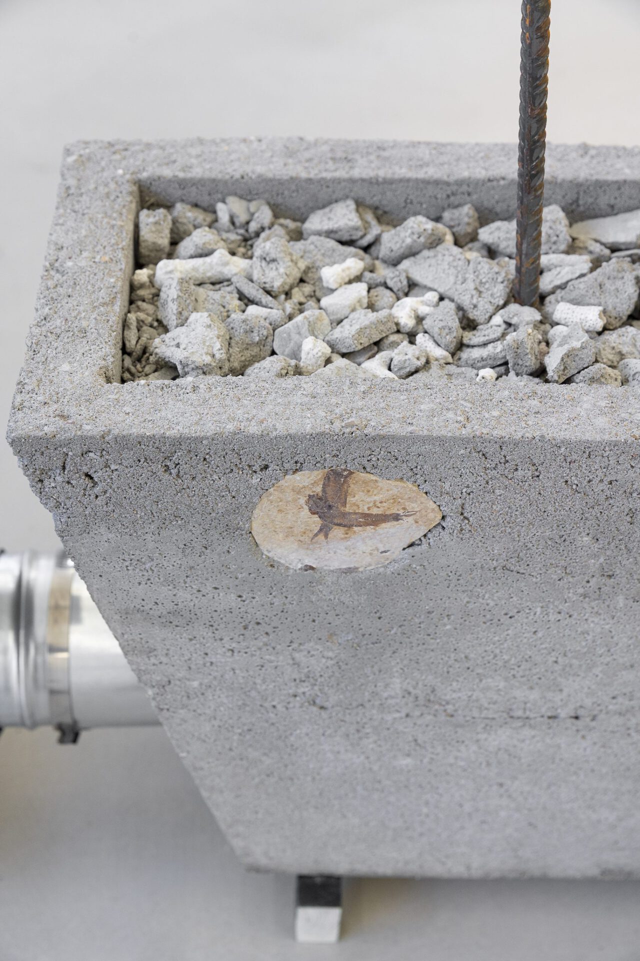 Josephine Baker - Versunkene Landschaft (Sunken Landscape) #2 (detail 5), 2022, cable, cable ties, concrete, concrete rubble, coral fragments, Dover chalk, epoxy resin, fossil fishes (Knight Alta, Eocene rock), paint, pine, plaster, plywood, rubber, security light, steel ducting, steel reinforcement bars, tube clips, 203x191.5x25 cm