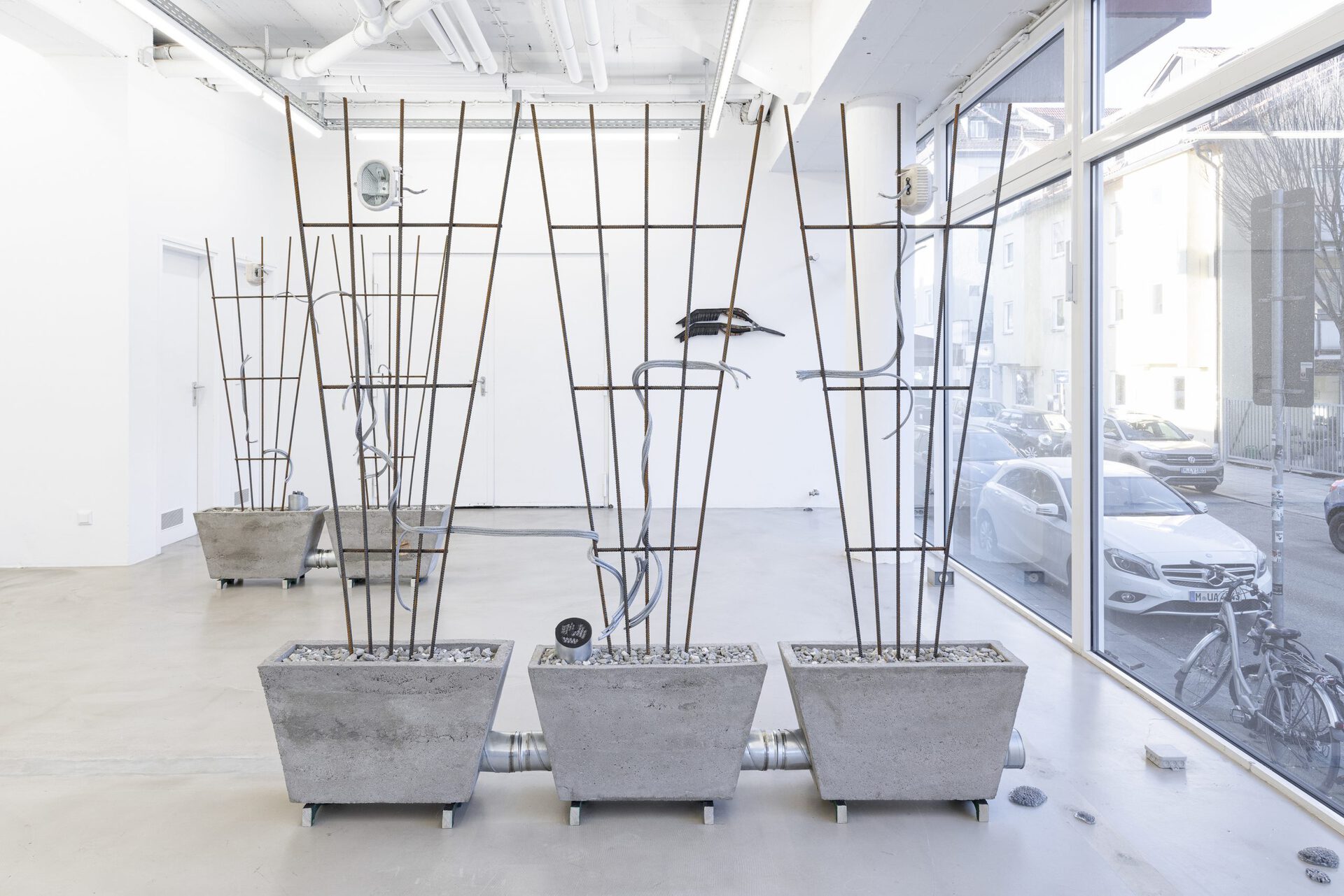 Josephine Baker - Versunkene Landschaft (Sunken Landscape) #2, 2022, cable, cable ties, concrete, concrete rubble, coral fragments, Dover chalk, epoxy resin, fossil fishes (Knight Alta, Eocene rock), paint, pine, plaster, plywood, rubber, security light, steel ducting, steel reinforcement bars, tube clips, 203x191.5x25 cm