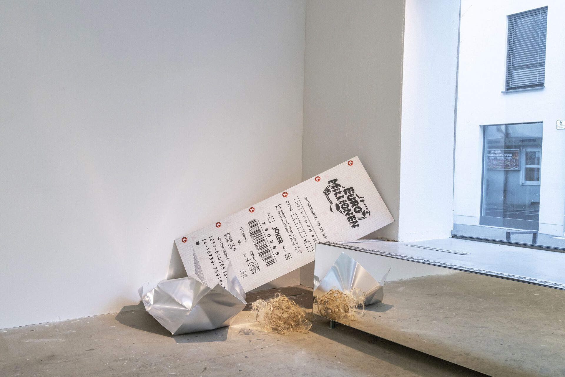 Lukas Matuschek, EuroMillionen, 2019, UV-Print on Alu dipond, 150x 55cm; Miguel Parrrra & Flora Lechner, Touchy Subjects, 2022, Aluminium,steel wire,faux hair, speakers