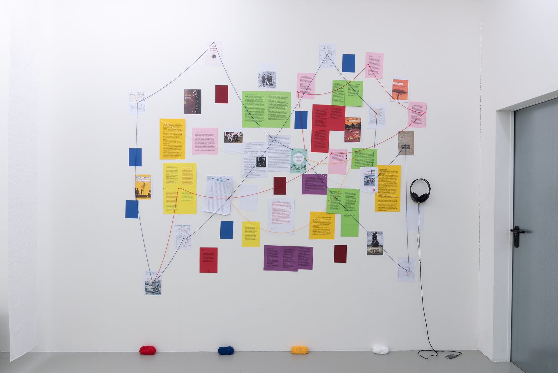 Joseph Kasau & Stephane Kabila. Geste des dieux, 2021. In three parts: HD video, sound, plexiglass; sound, paper, strings, glue; mirror, glass, laser print, cups.