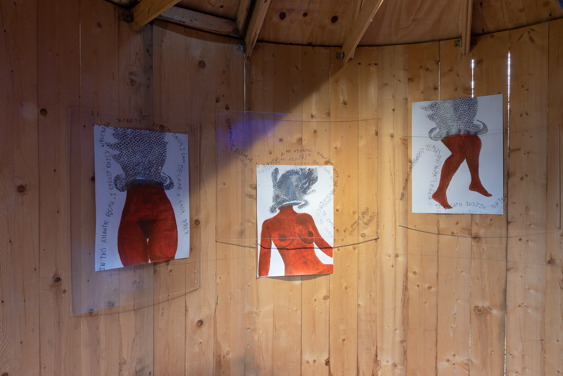 Maya Quilolo. Who carries the Atlantic’s secrets has learned to breathe inside water, 2021. Drawings, plexiglass (words), fishing nets, video, chest, ceramic.