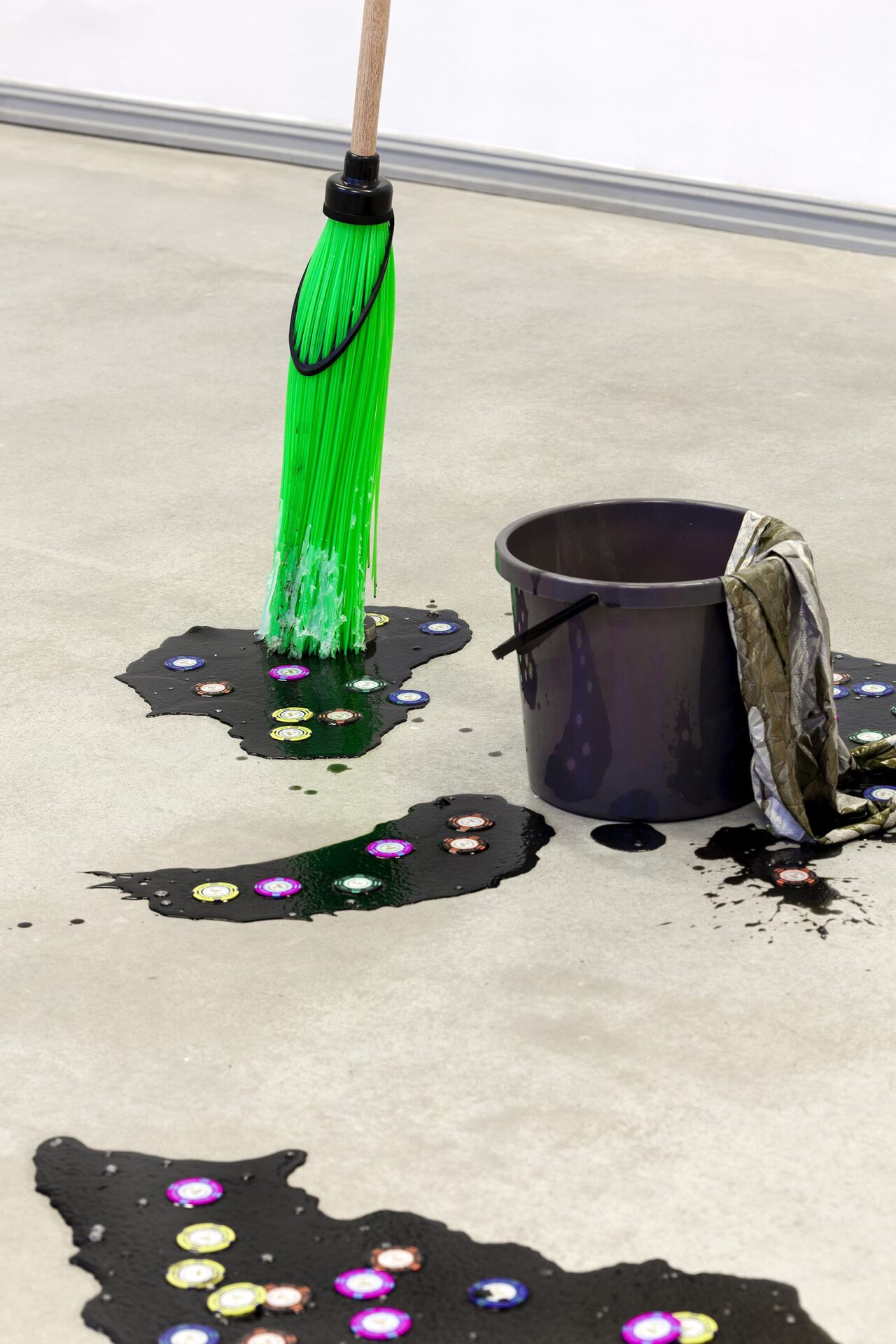 6 Sven Parker. Witches of Faraday, 2022, installation, buckets, brooms, poker chips, faraday shielding fabric, paint pigments, silicone, latex, pigment, dimensions variable. Photo by Roman-Sten Tõnissoo