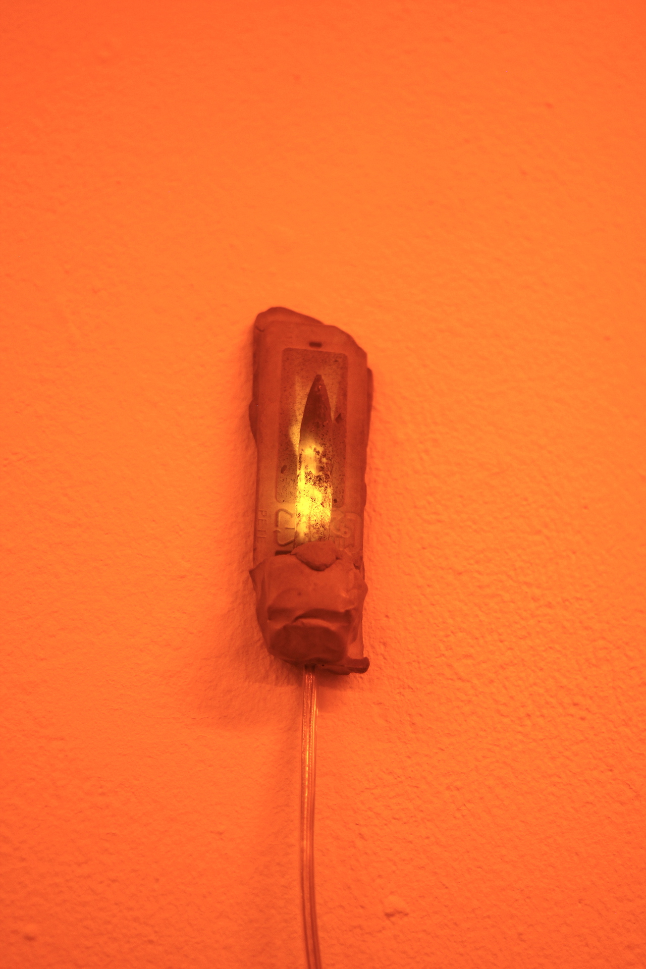 Hunter Longe Elizabeth Philpot IV 2021 Belemnite fossil, flickering LED, magnetite sand, gypsum cement, epoxy clay, graphite, pigments, squid ink, 66 x 120 x 28 mm