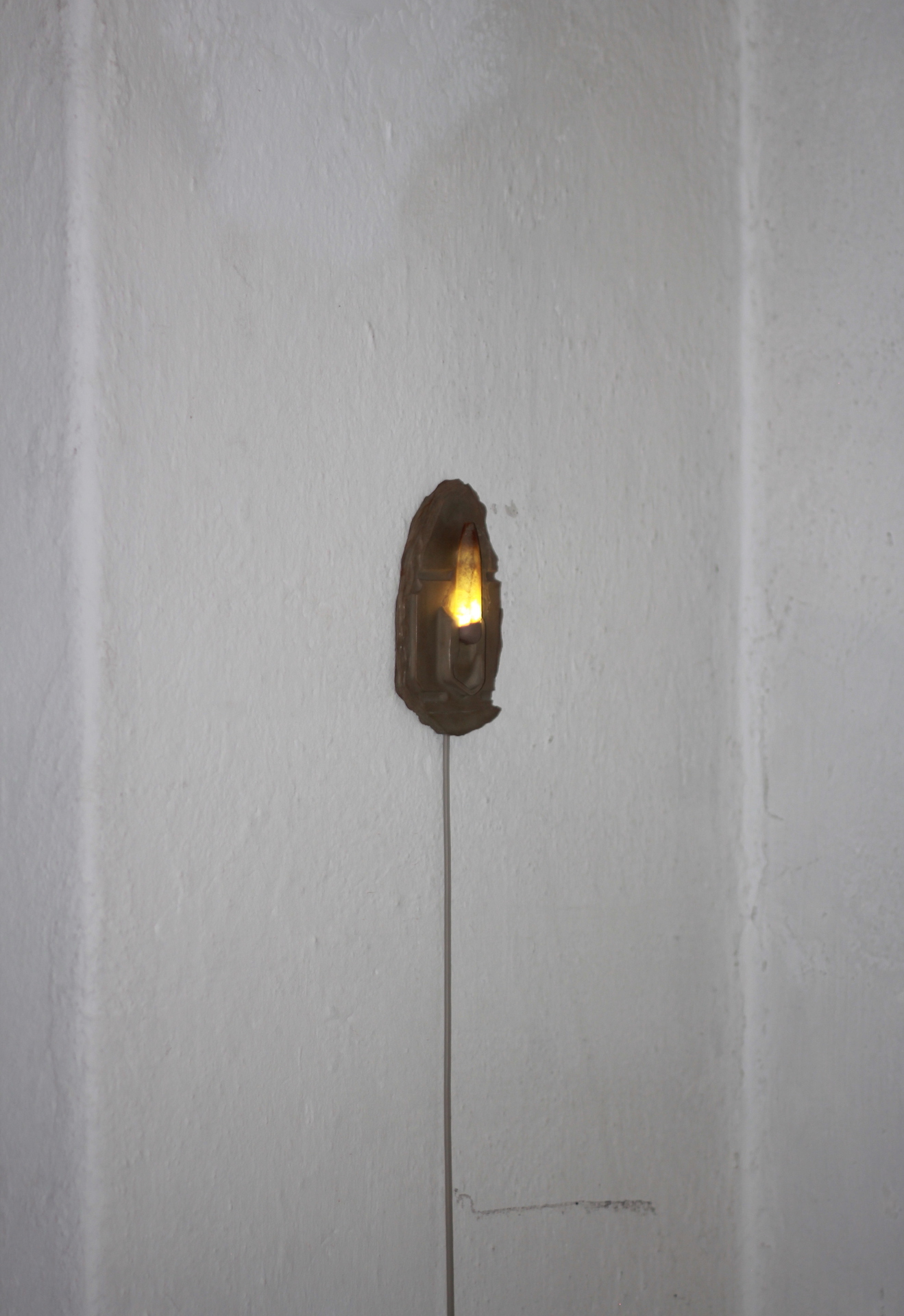 Hunter Longe, Elizabeth Philpot XIV, 2021 Belemnite fossil, flickering LED, magnetite sand, gypsum cement, epoxy clay, graphite, pigments, squid ink 66 x 120 x 28 mm