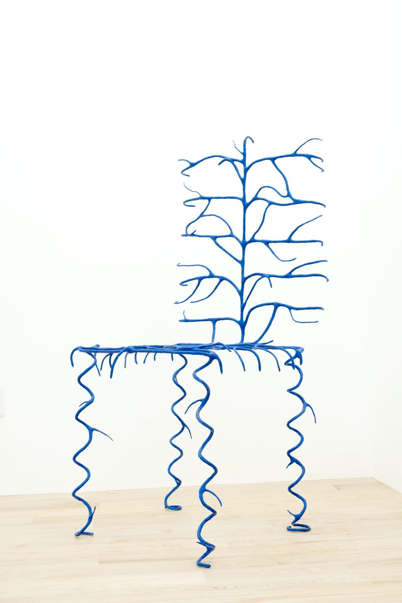 Kian McKeown, Blue Chair, 2021, armature wire, epoxy putty, paint, 51x21 11/16 x 20 1/2 in