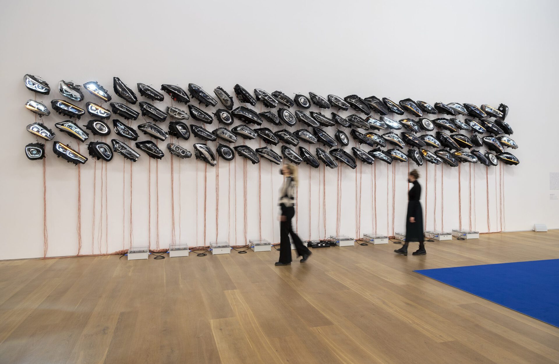 Madeline Hollander "Sunrise/Sunset", 2021 Recycled automobile headlights, speaker cables, and terminal boxes