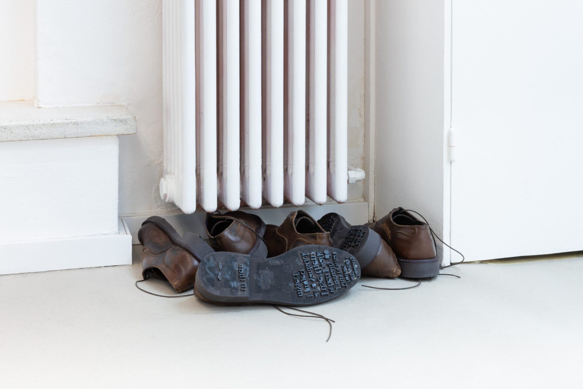 Francesco De Bernardi,  “Stroll”, Four pairs of shoes, wood, black paint, 2022