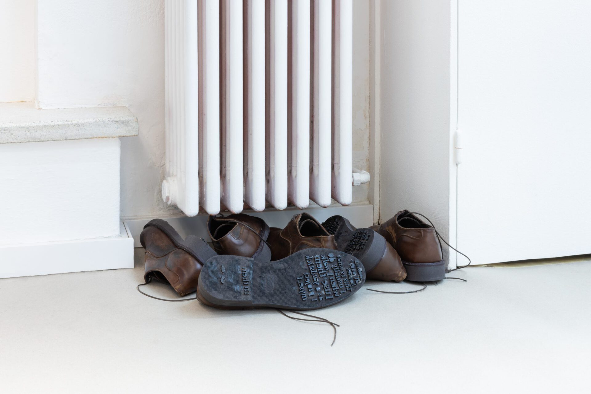 Francesco De Bernardi, “Stroll”, Four pairs of shoes, wood, black paint, 2022