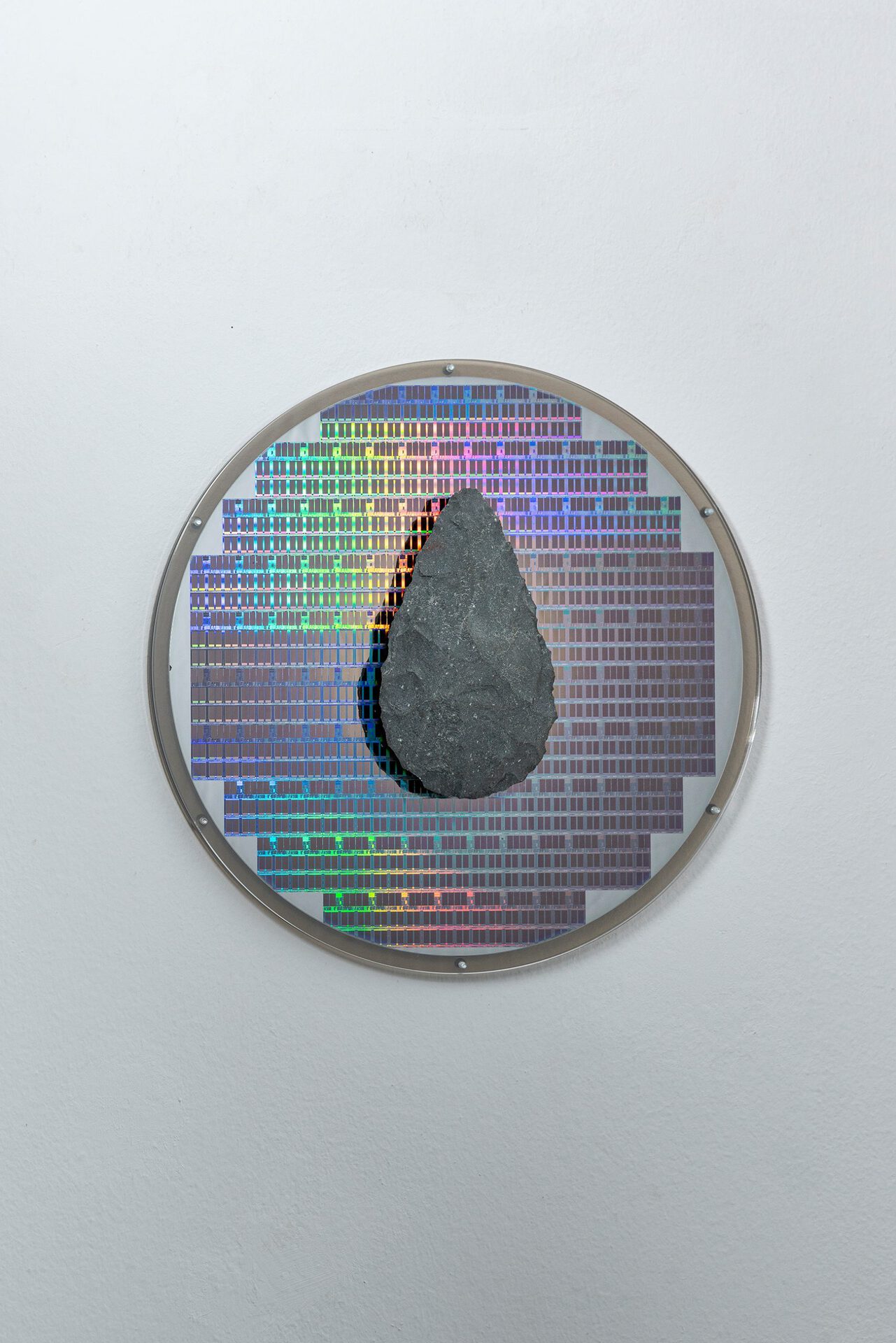 Troika, Evolutionary Composite, 2022, Silicon wafer, flint biface and perspex, 32 x 32 x 5 cm