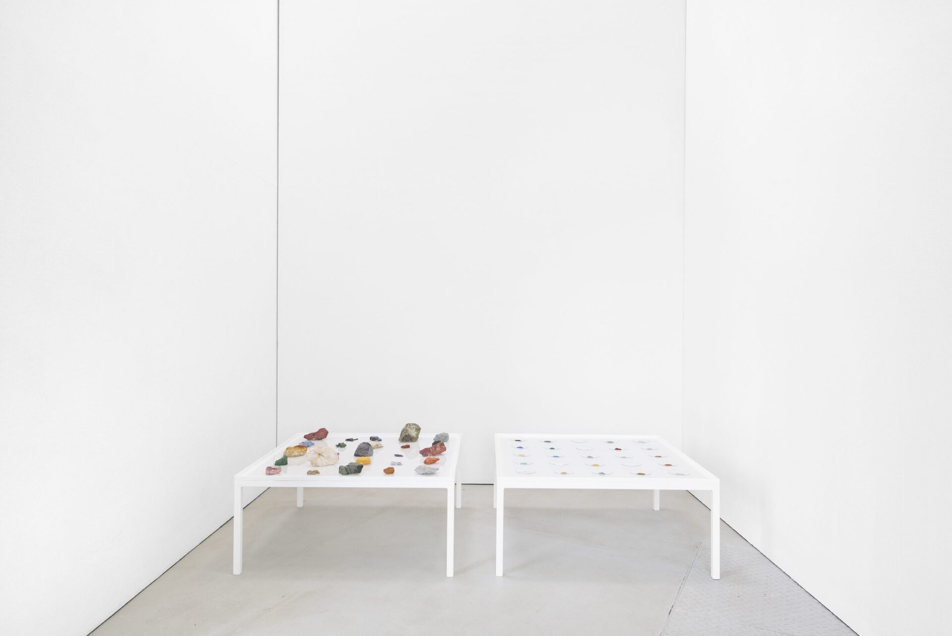 Elsa Salonen, Stories Told by Stones (The Narrators), mineral stones, earths, pigments ground from them, laboratory glasses, metal tables 2018, two tables, each 45x100x100 cm