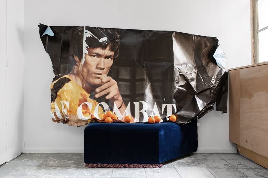 Daniela Baldelli, "Sagrada" (2022), sculptural installation, poster, couch, oranges, 156 x 235 x 62 cm