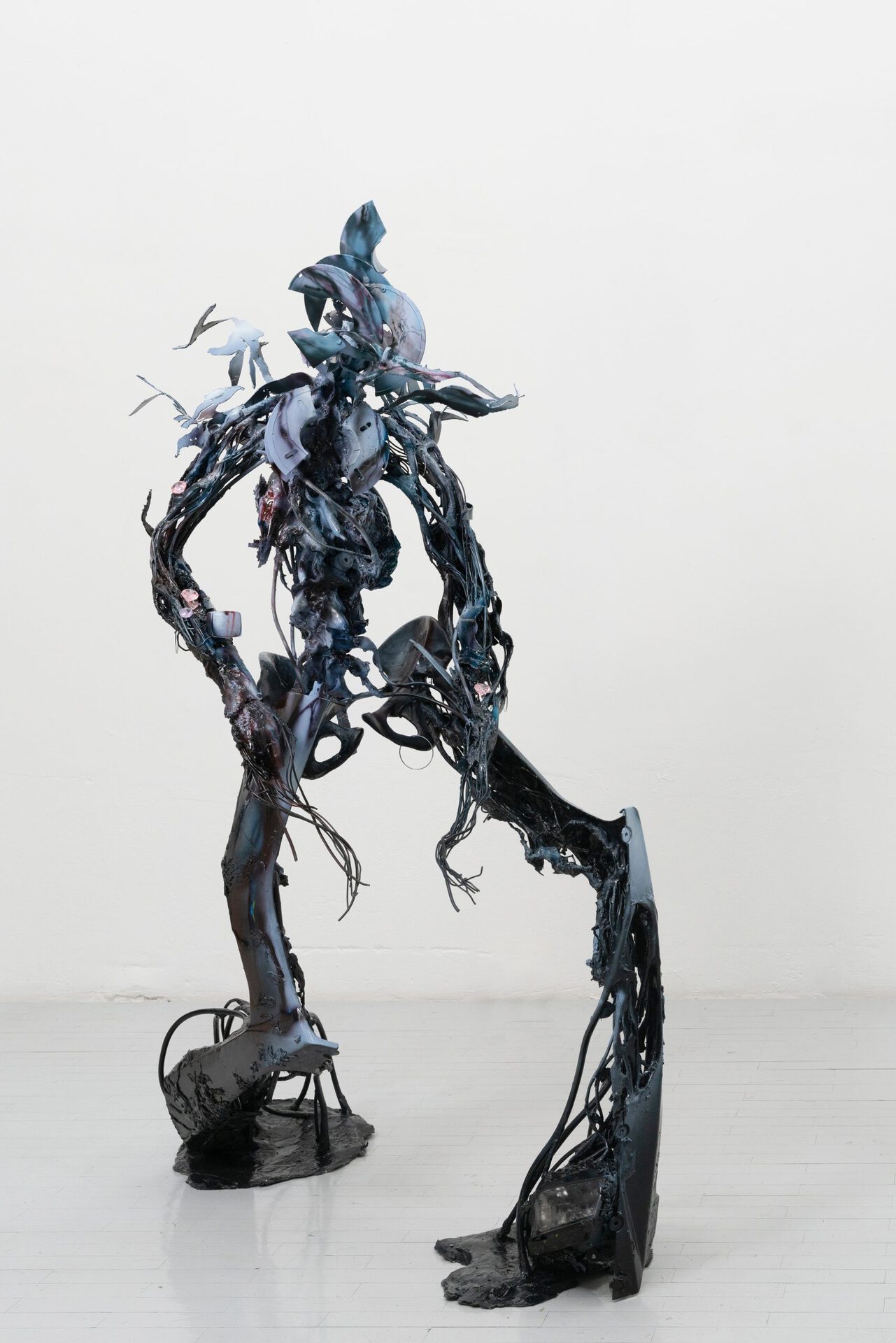Yein Lee, Savior syndrome or good girl complex, starring perpetual past, 2022, electrical wire, epoxy putty, steel, plaster of paris, motorbi- ke parts, paint, plastic waste