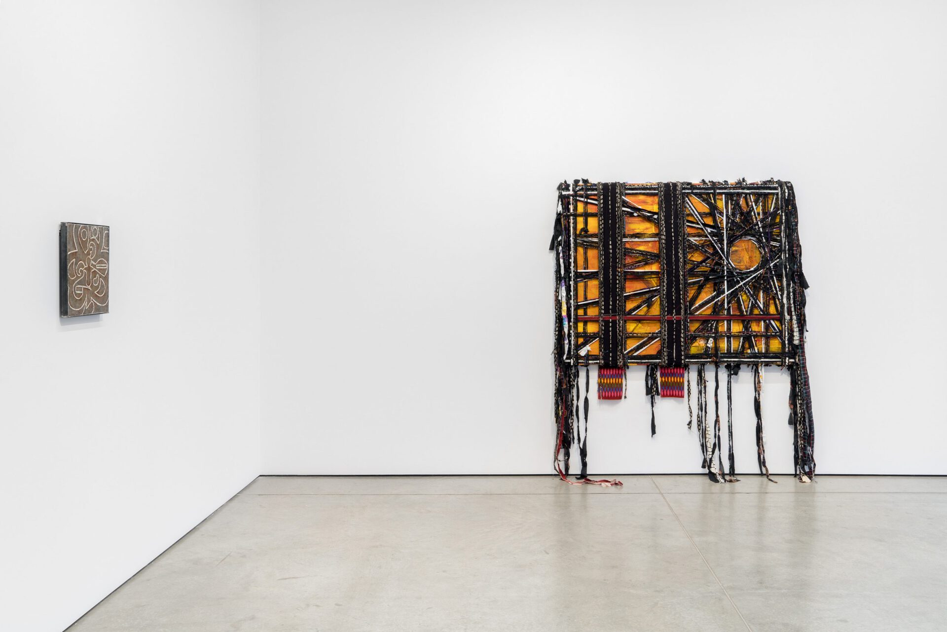 Cyle Warner, Untitled Exodus (Still Happening), 2021, Fabric, paper, acrylic on canvas 215.9 x 175.3 cm. (85 x 69 in.); Azza El Siddique, underground storage, 2021. Steel, 36.2 x 31.8 x 2.5 cm. (14¼ x 12½ x 1 in.).