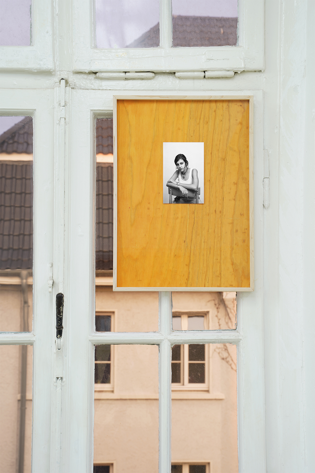 Mika Schwarz, Klasse, class, 2022, analogue b/w print (photograph ca. 2003), stained wood panel, 34,5 x 48 cm