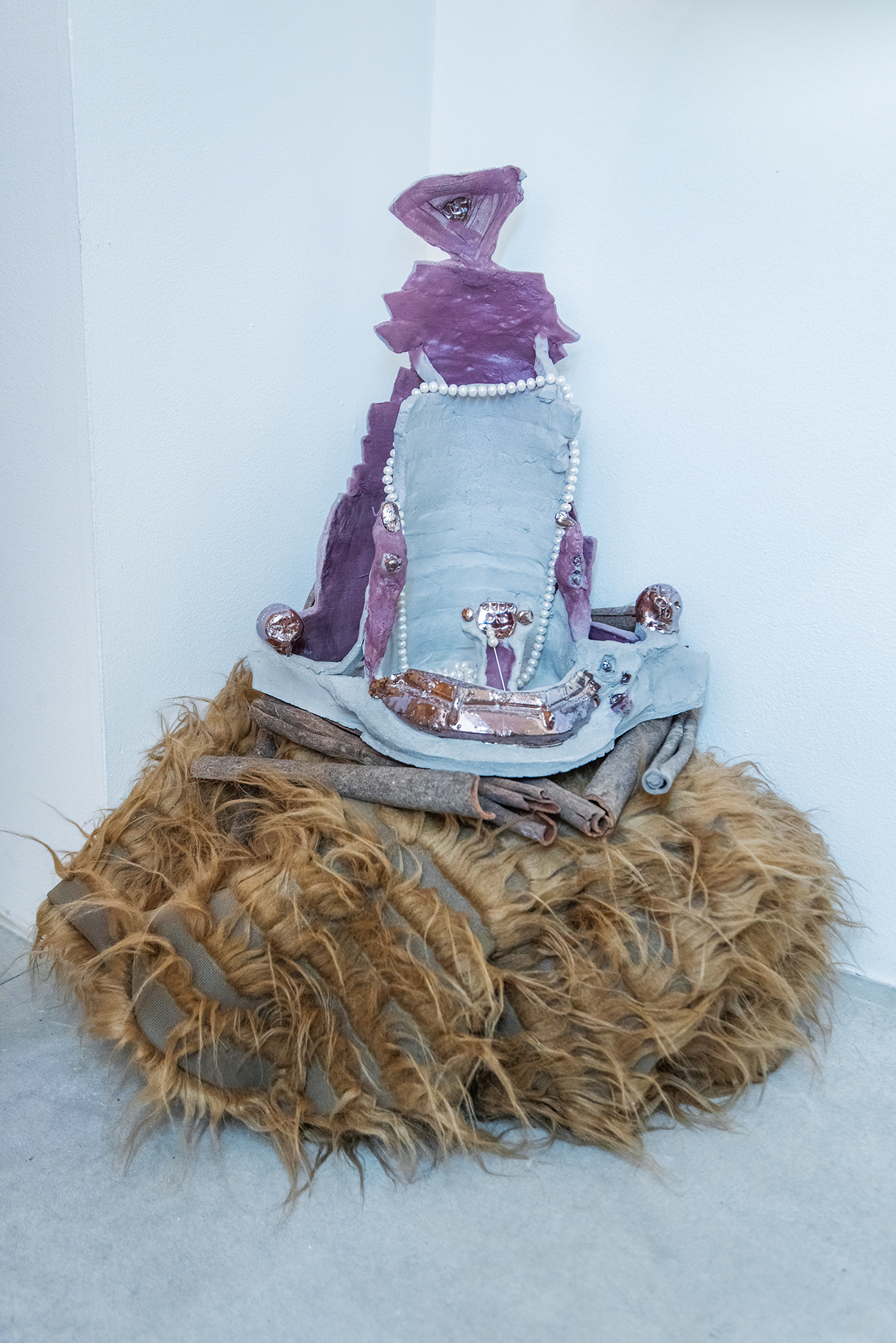 Bodyssey Craft, 2022, glazed ceramic, pearls, cinnamon sticks, faux fur fabric, 45 x 40 x 27 cm
