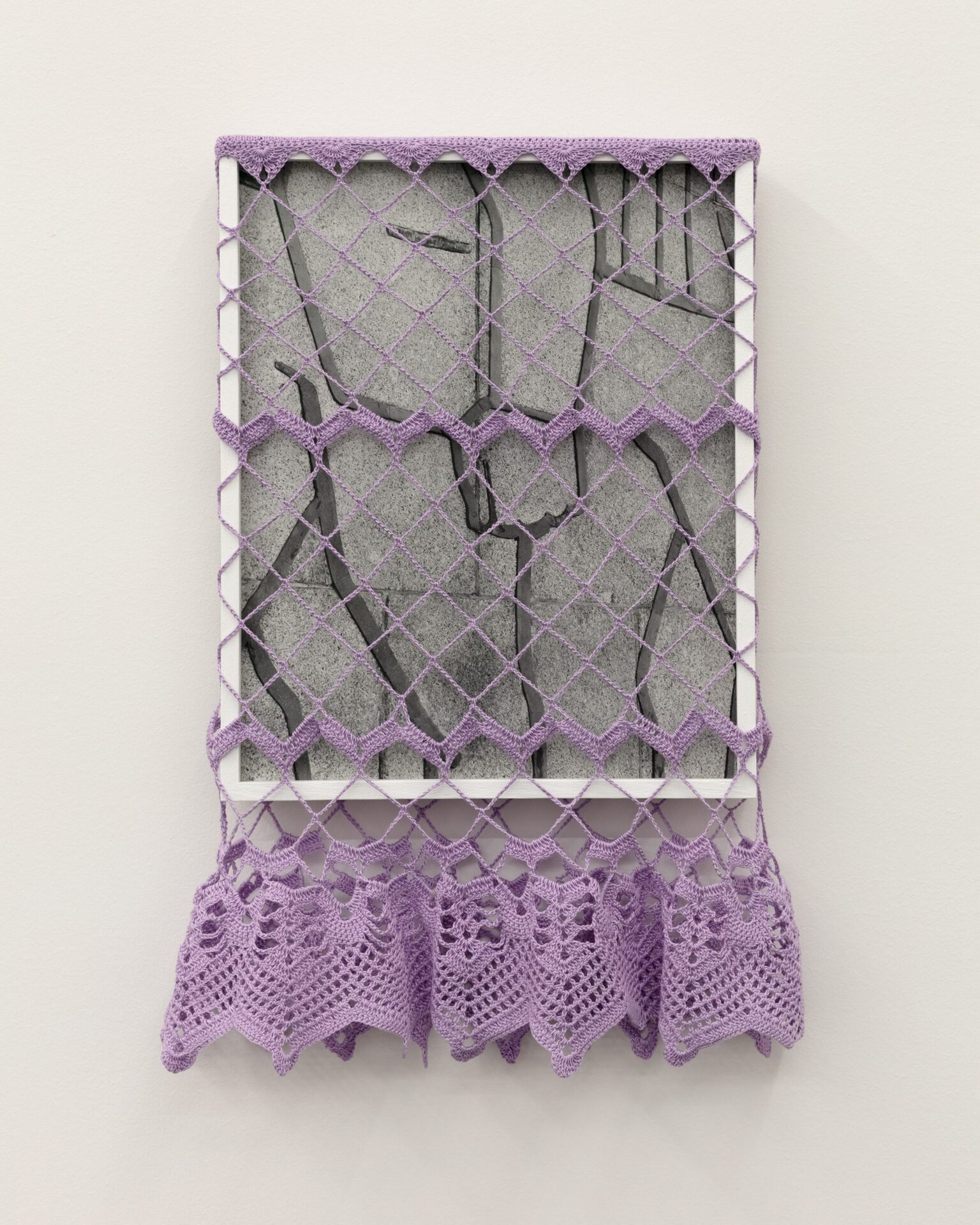 Anna Orłowska, Fist, 2022, Gelatine silver print, mounted on dibond, ivory wooden frame, museum glass, cotton crochet, unique, 37 x 30 cm
