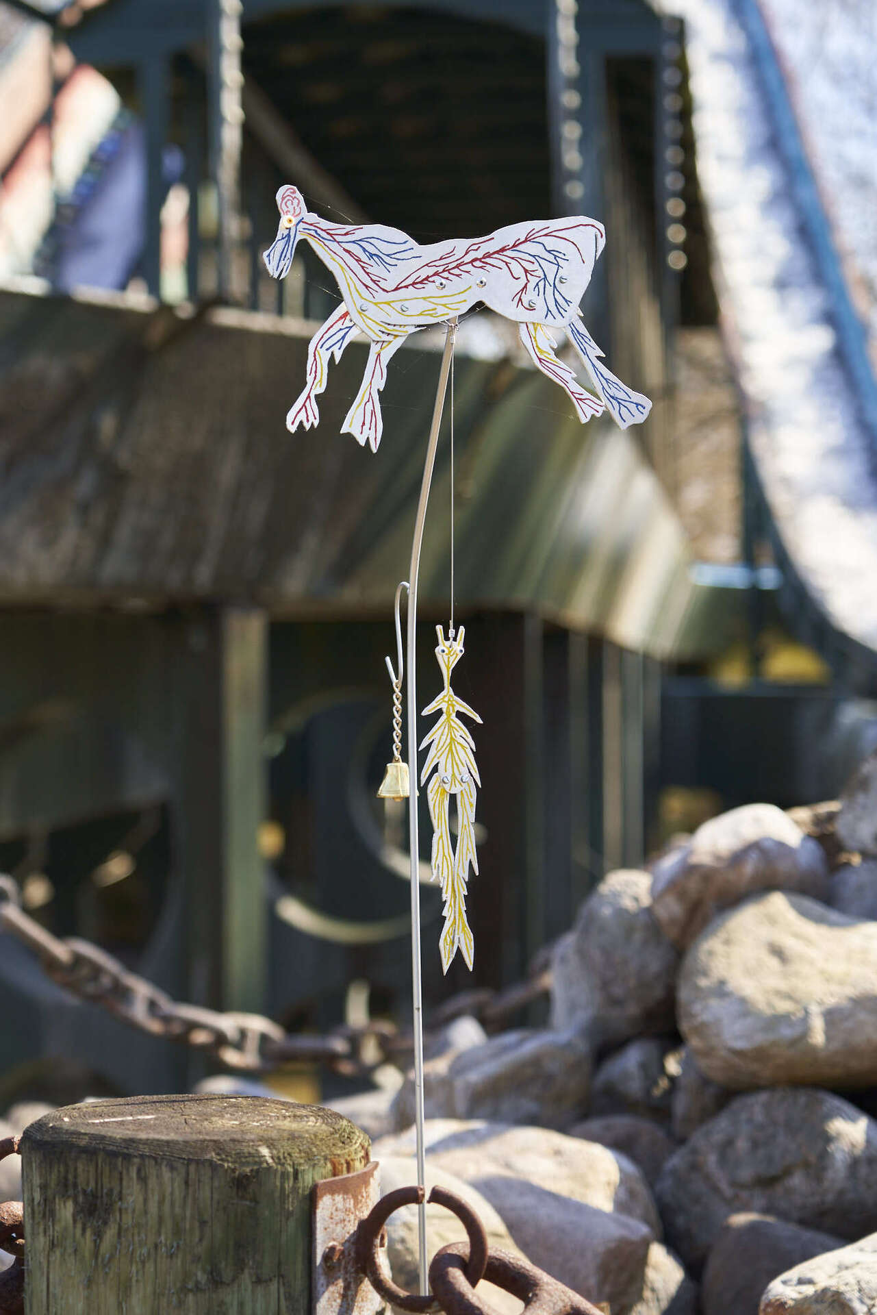 Mia Edelgart & Sebastian Hedevang, Dance Macabre, 2022, Aluminum, stainless steel, rivets, enamel paint, glass eyes, wires, bells, locks, chains, rubber hoses, water pump.