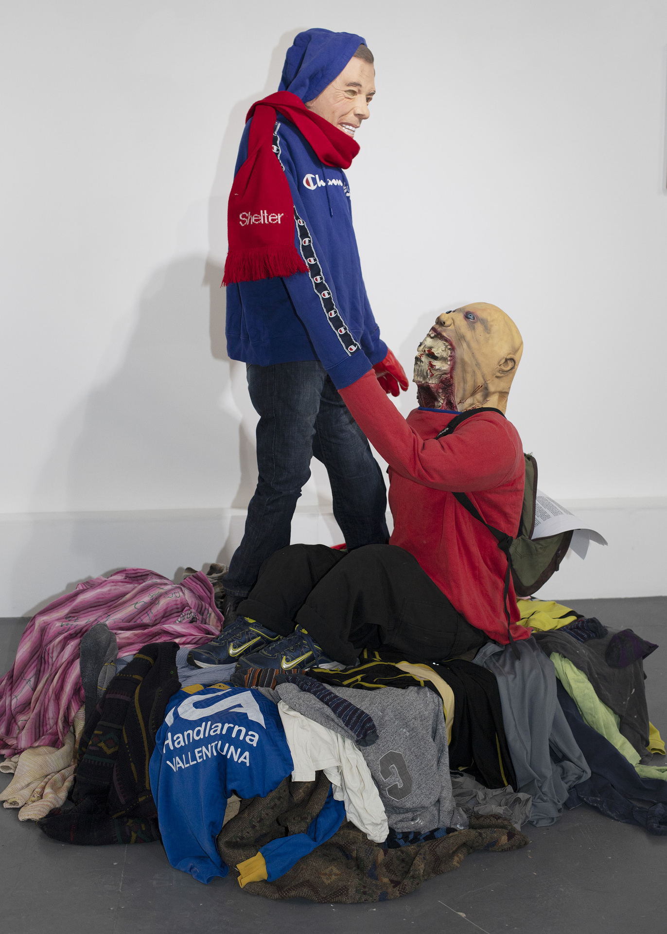 The Spirit of Brotherhood, representing the strong helping the weak, outside the TUC’s Congress House as adolescent wearies, 2022 Clothes, wood, pvc, coconut hair, recycled plastic