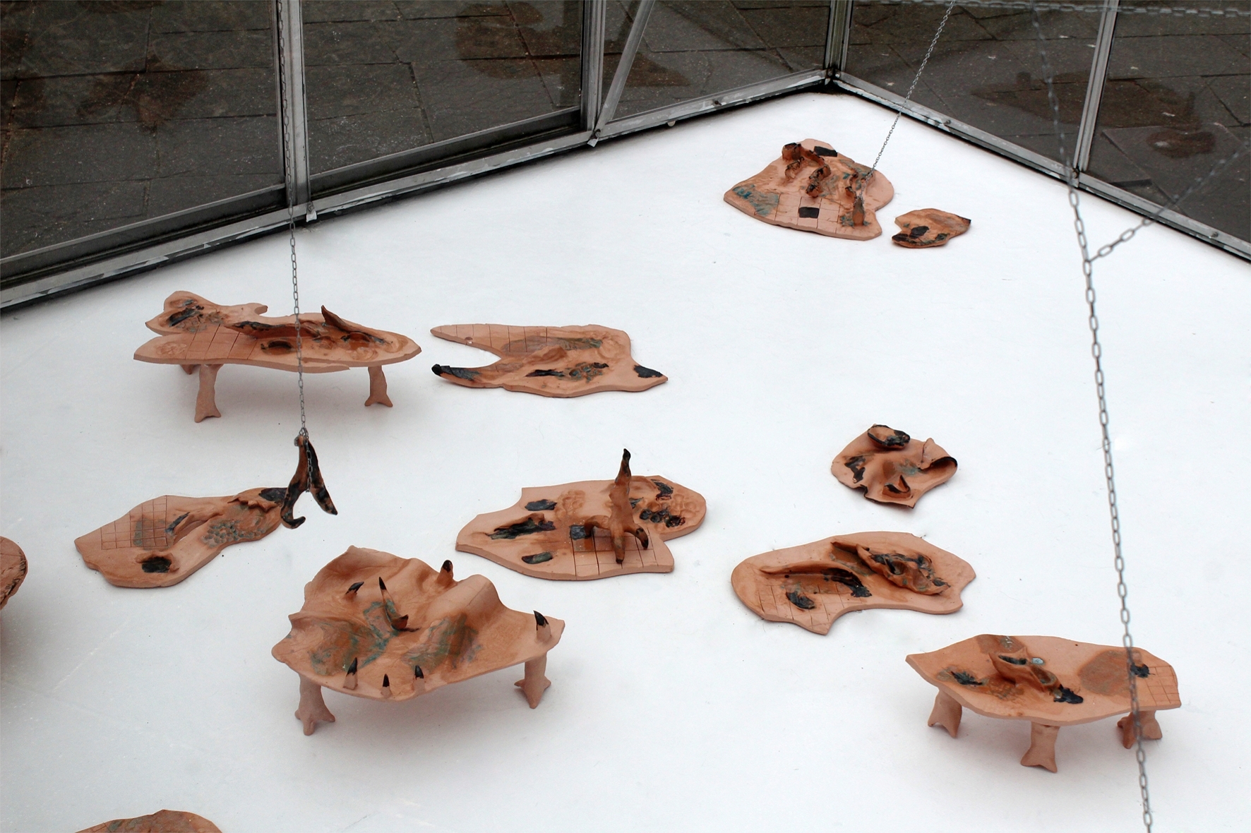 Anna Bochkova, Security Skin, 2022, ceramics series of floor works, diverse dimensions