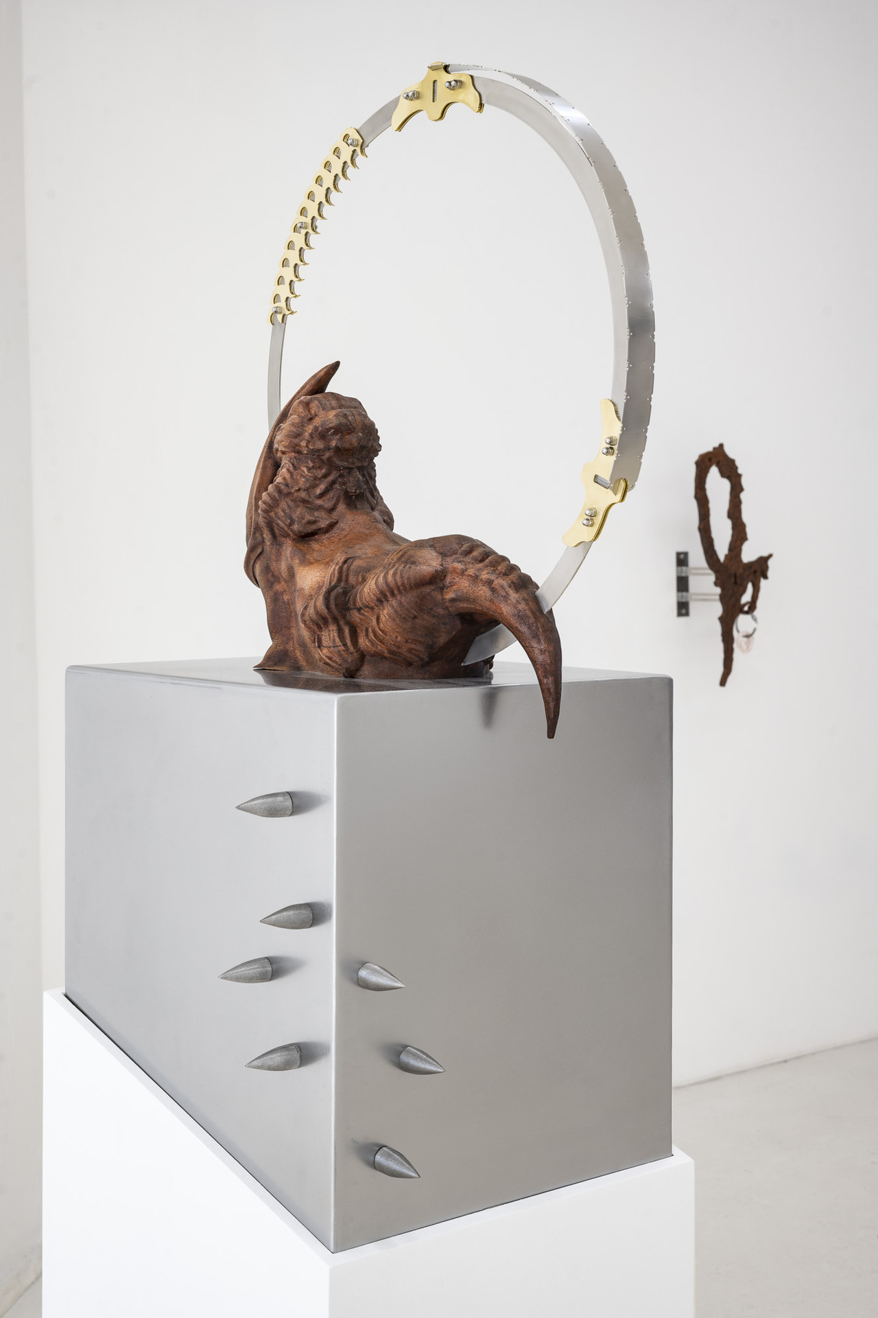 Inside Job, “Voracity Loop”, 2022, mahogany wood, stainless steel, brass , 40 x 45 x 178cm