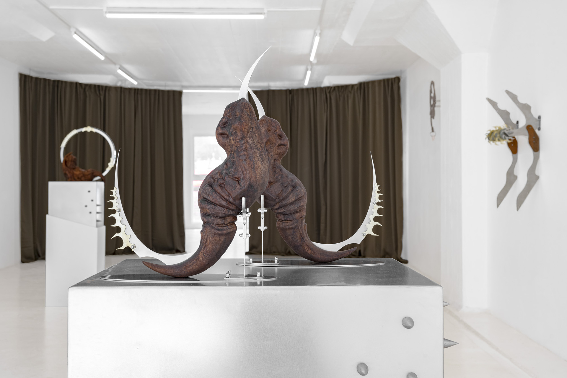 Inside Job, “Claws (continuity) I-II”, 2022, mahogany wood, stainless steel, brass, , 56 x 56 x 142 cm