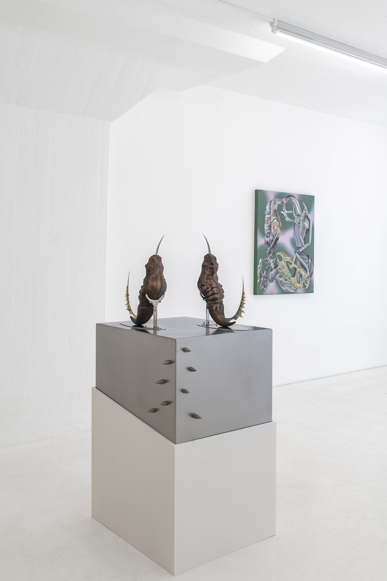 Inside Job, “Claws (continuity) I-II”, 2022, mahogany wood, stainless steel, brass, 56 x 56 x 142 cm