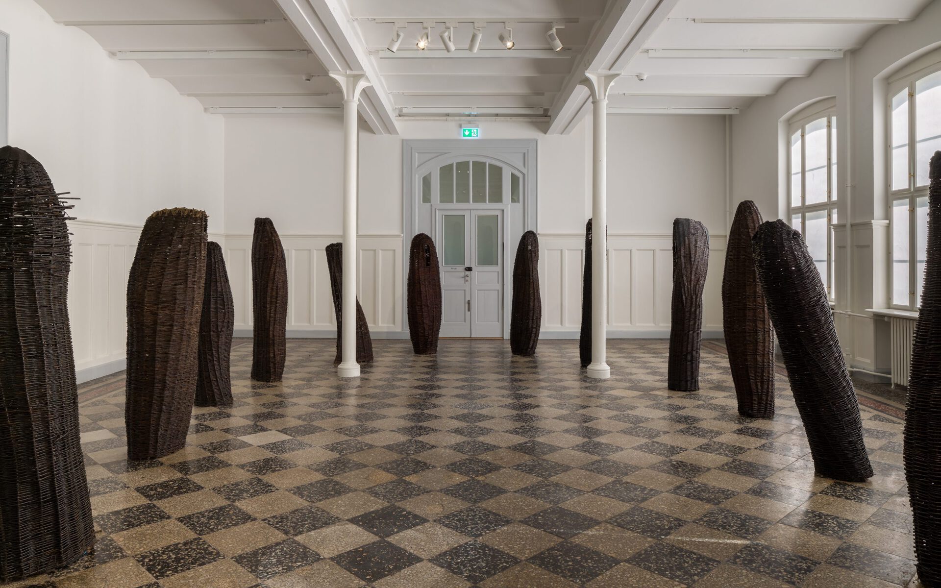 Annette Holdensen, willow monoliths, 1986, willow and shellac, variable dimensions