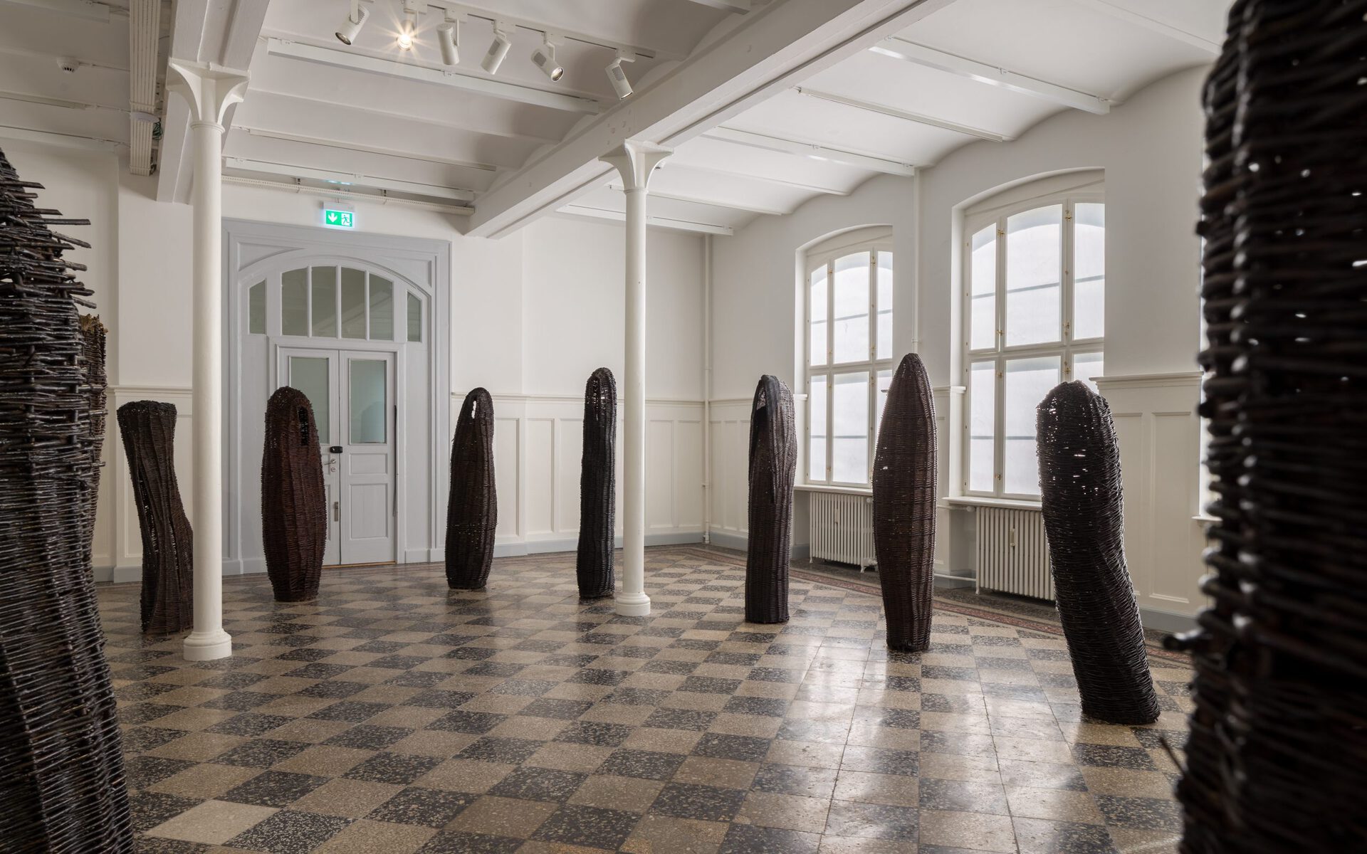 Annette Holdensen, willow monoliths, 1986, willow and shellac, variable dimensions