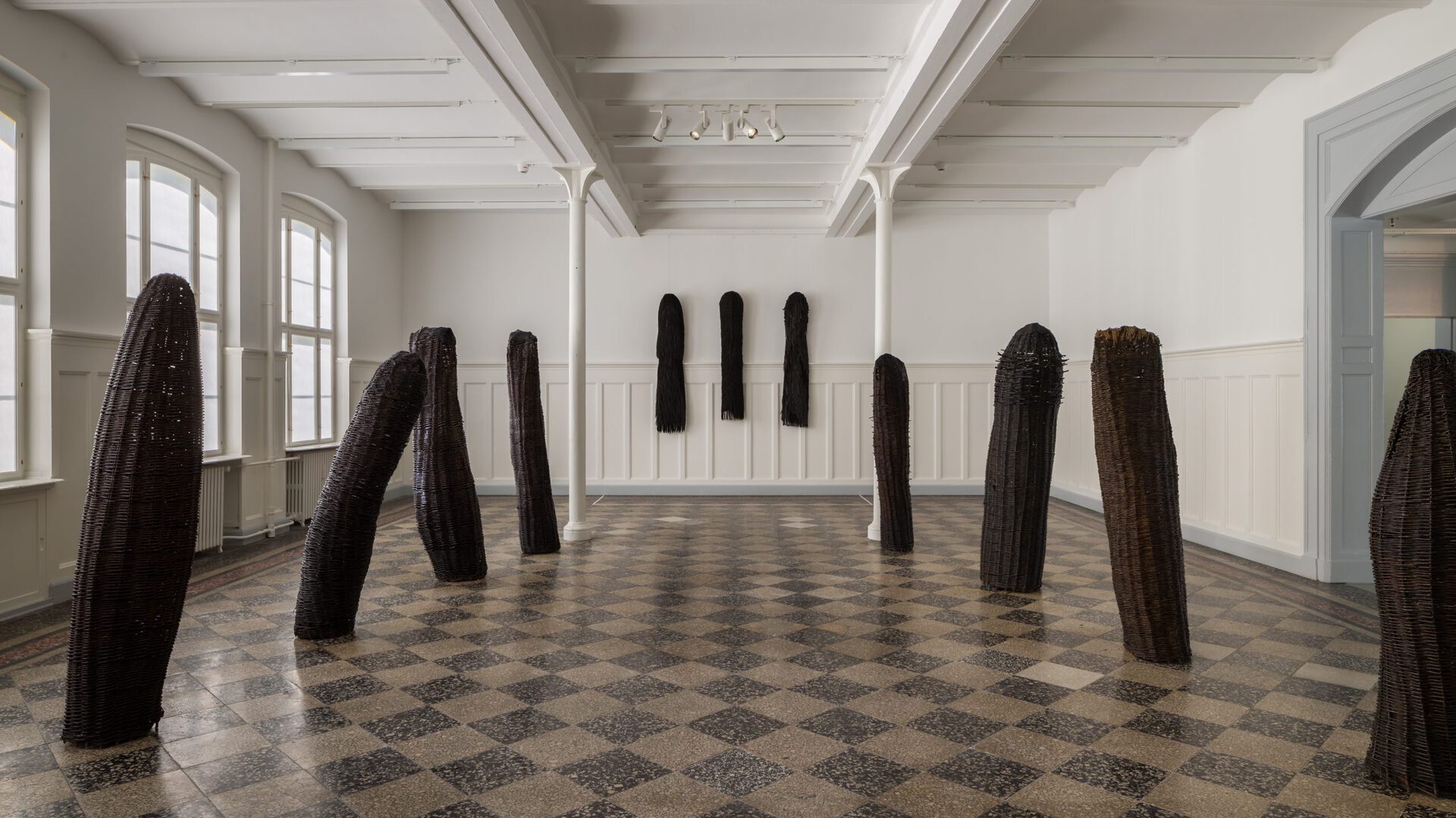 Annette Holdensen, willow monoliths, 1986, willow and shellac, variable dimensions