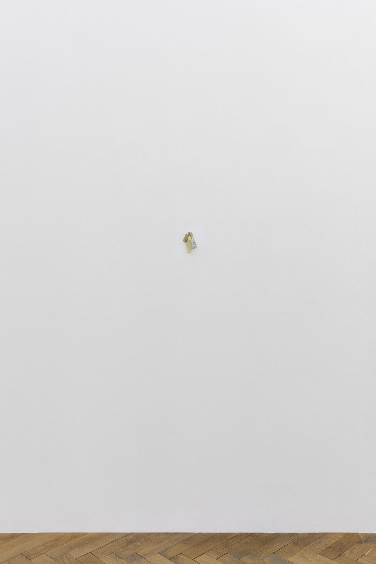 David Fesl, Untitled, 2022, sea mineral, kitchen utensil handle, blender whisk, mobile phone keyboard, silk thread,10.9 × 7.2 × 5.3 cm