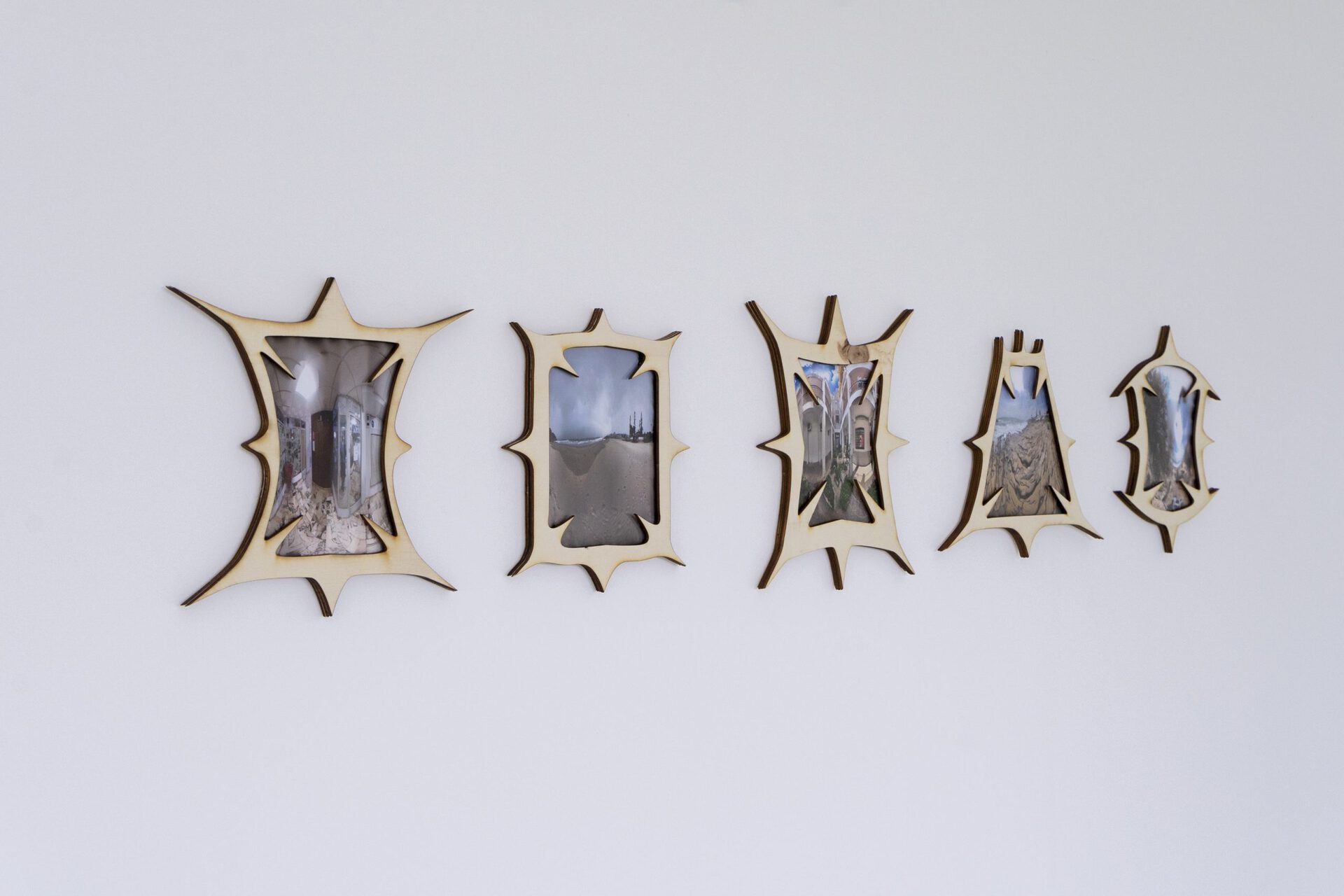 Theresa Weisheit, a quick cigarette by the beach while the baby is asleep, installation view 2, 2022, layered wood, c-prints, 5 x 18 x 13 cm