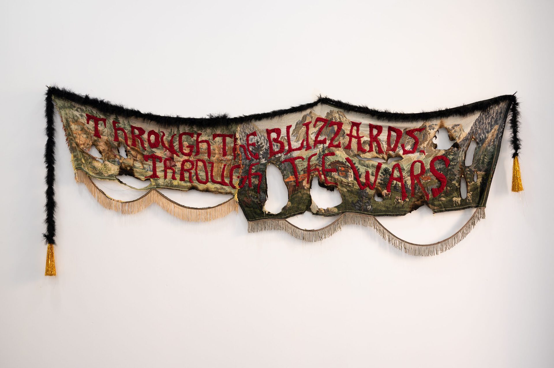 Gvantsa Jishkariani, THROUGH THE BLIZZARDS, THROUGH THE WARS, 2022, Embroidery on reworked and burnt vintage Soviet period tapestry with golden fringes. 258 x 103cm