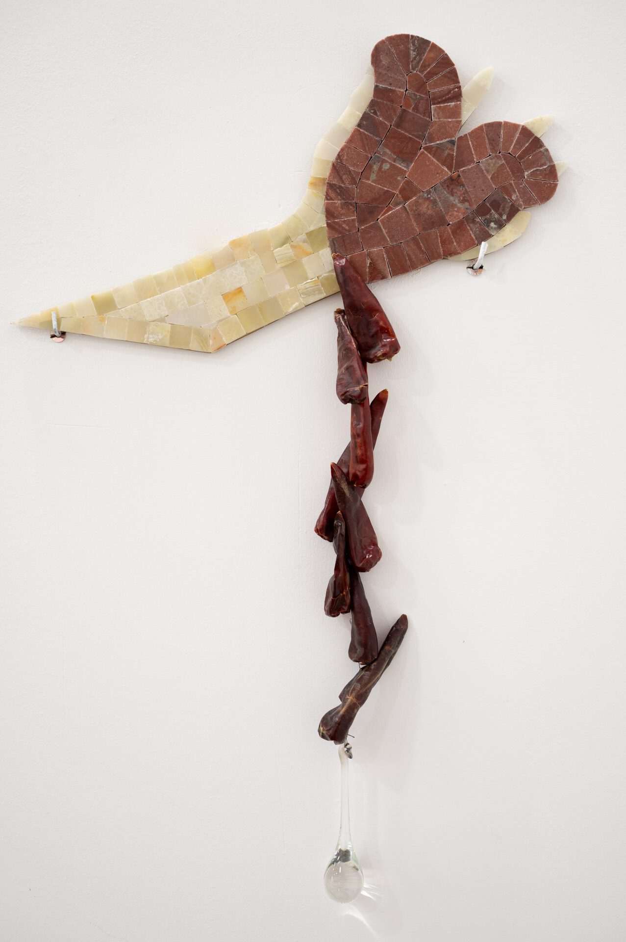 Gvantsa Jishkariani, LIQUID, BUT SOUR, 2022 ONYX AND TRAVERTINE MOSAIC, DRIED PEPPER BEAD, CRYSTAL TEAR 40X59X1CM