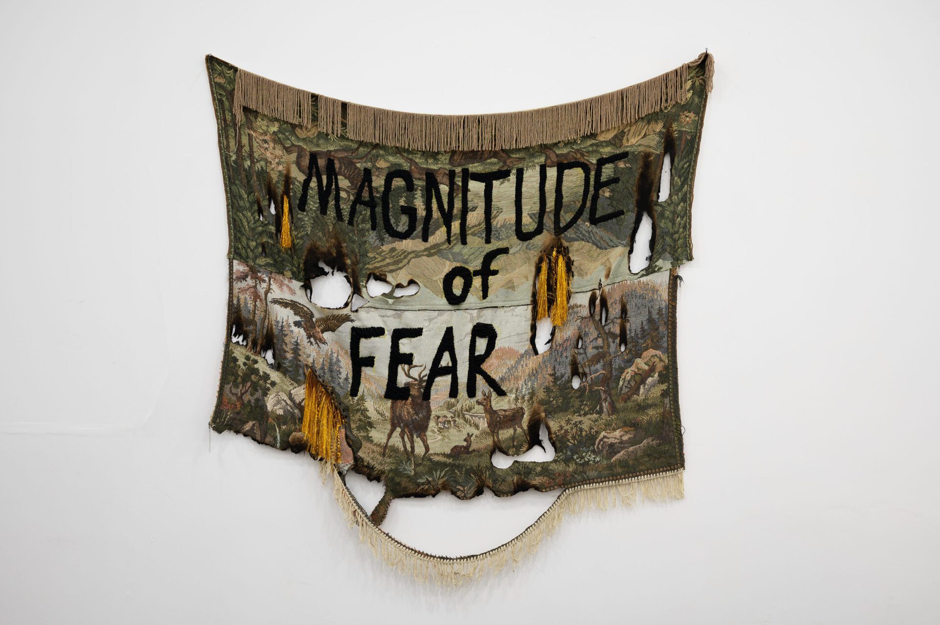 Gvantsa Jishkariani, Magnitude of Fear, 2022,Embroidery on reworked and burnt vintage Soviet period tapestry with golden fringes. 120 x 150 cm