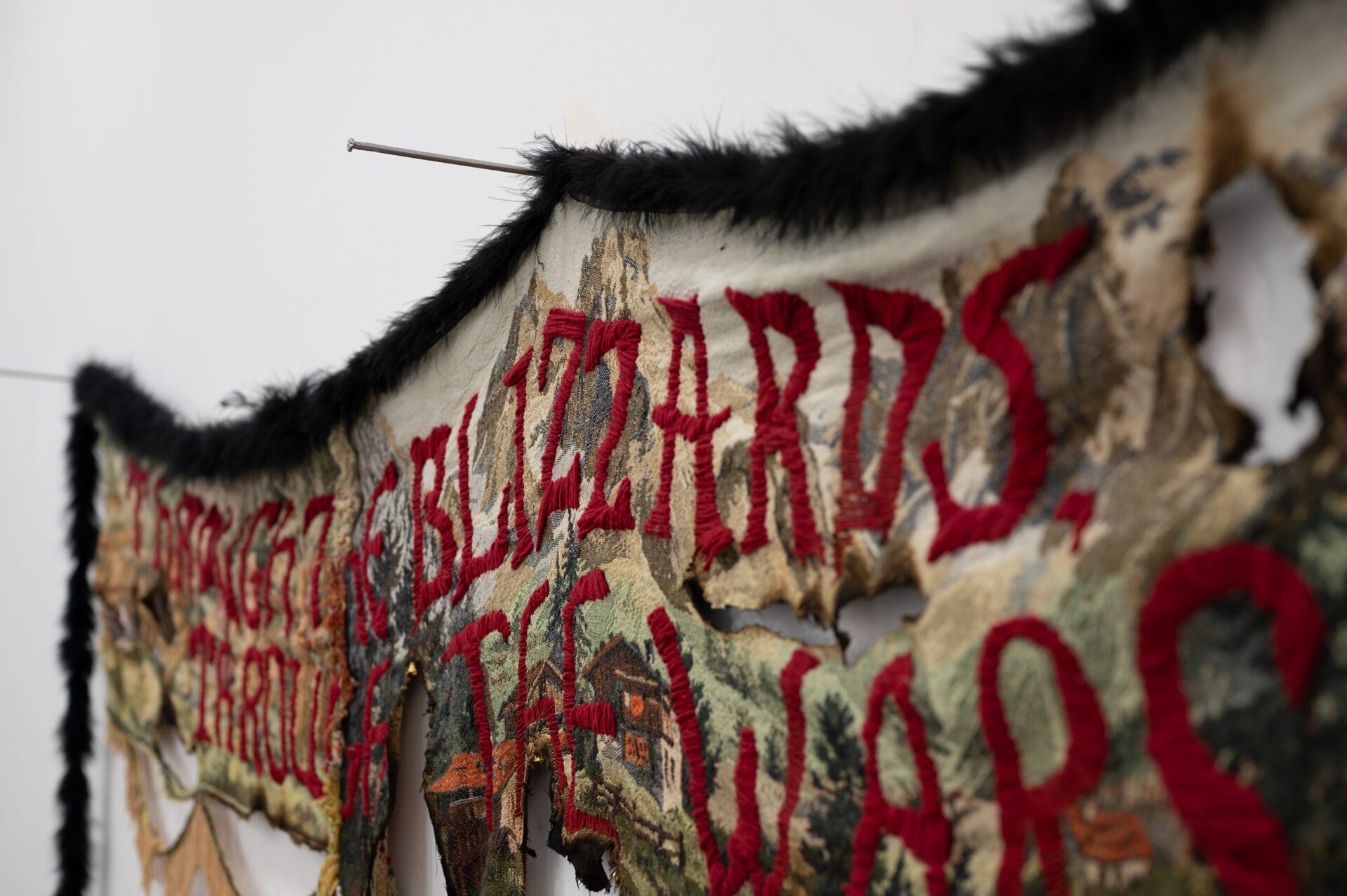 Gvantsa Jishkariani, THROUGH THE BLIZZARDS, THROUGH THE WARS, 2022, Embroidery on reworked and burnt vintage Soviet period tapestry with golden fringes. 258 x 103cm, detail