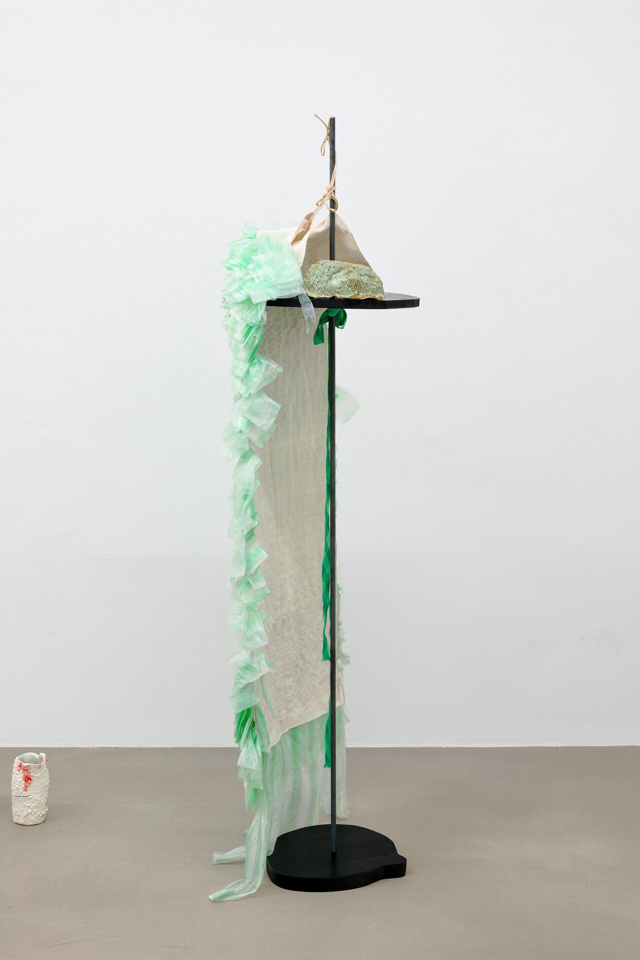 Johanna Magdalena Guggenberger, Frl. C, 2022, fabric, glazed ceramic, plastic bags on linen, threads, painted wood, metal, 161 × 50 × 40 cm. Courtesy Wonnerth Dejaco, Belmacz and the artist. Photo: Peter Mochi