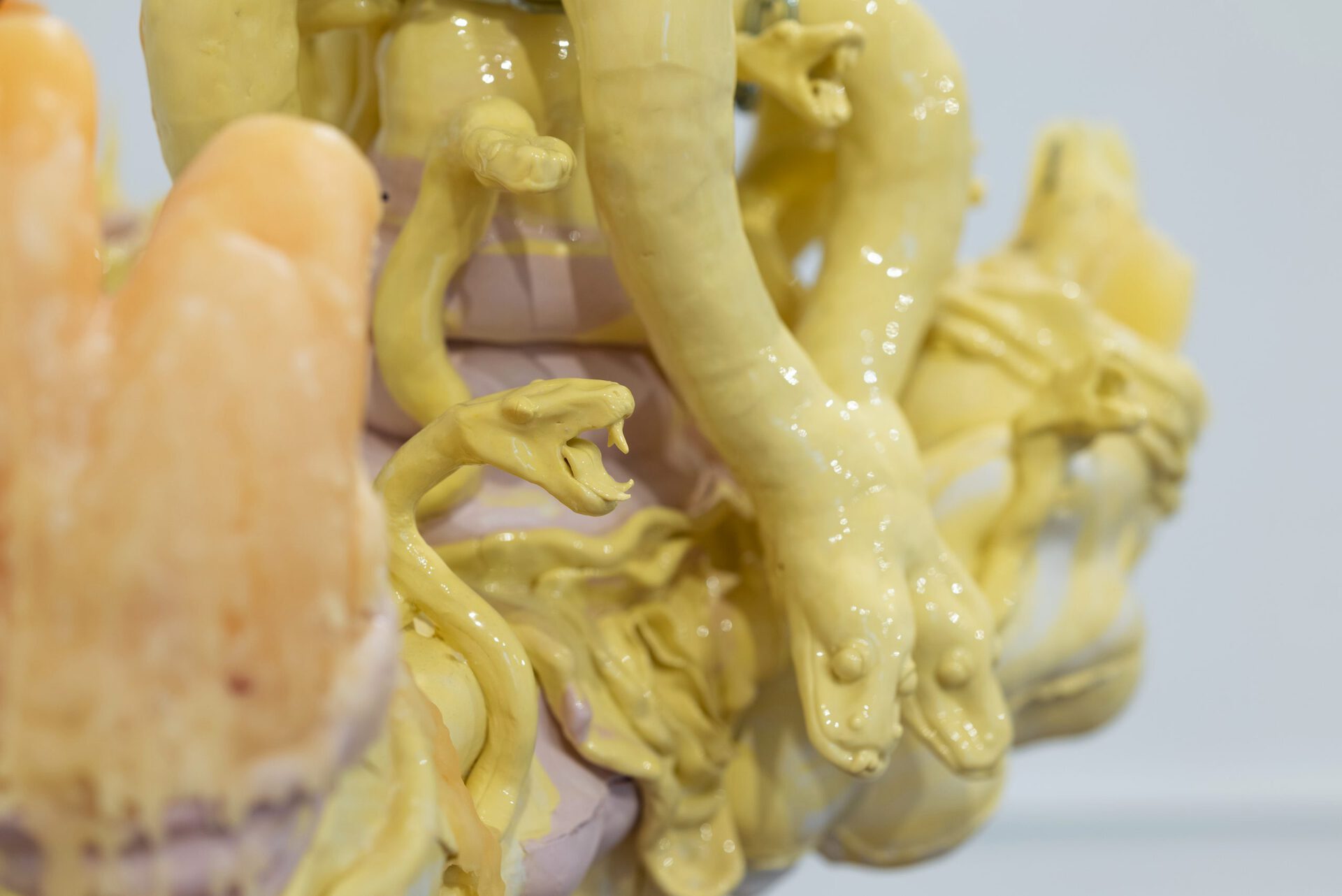 Julia Belova "Chandelier with Yellow Snakes" 2022 porcelain, chain, glaze, wax 50x50x45 cm
