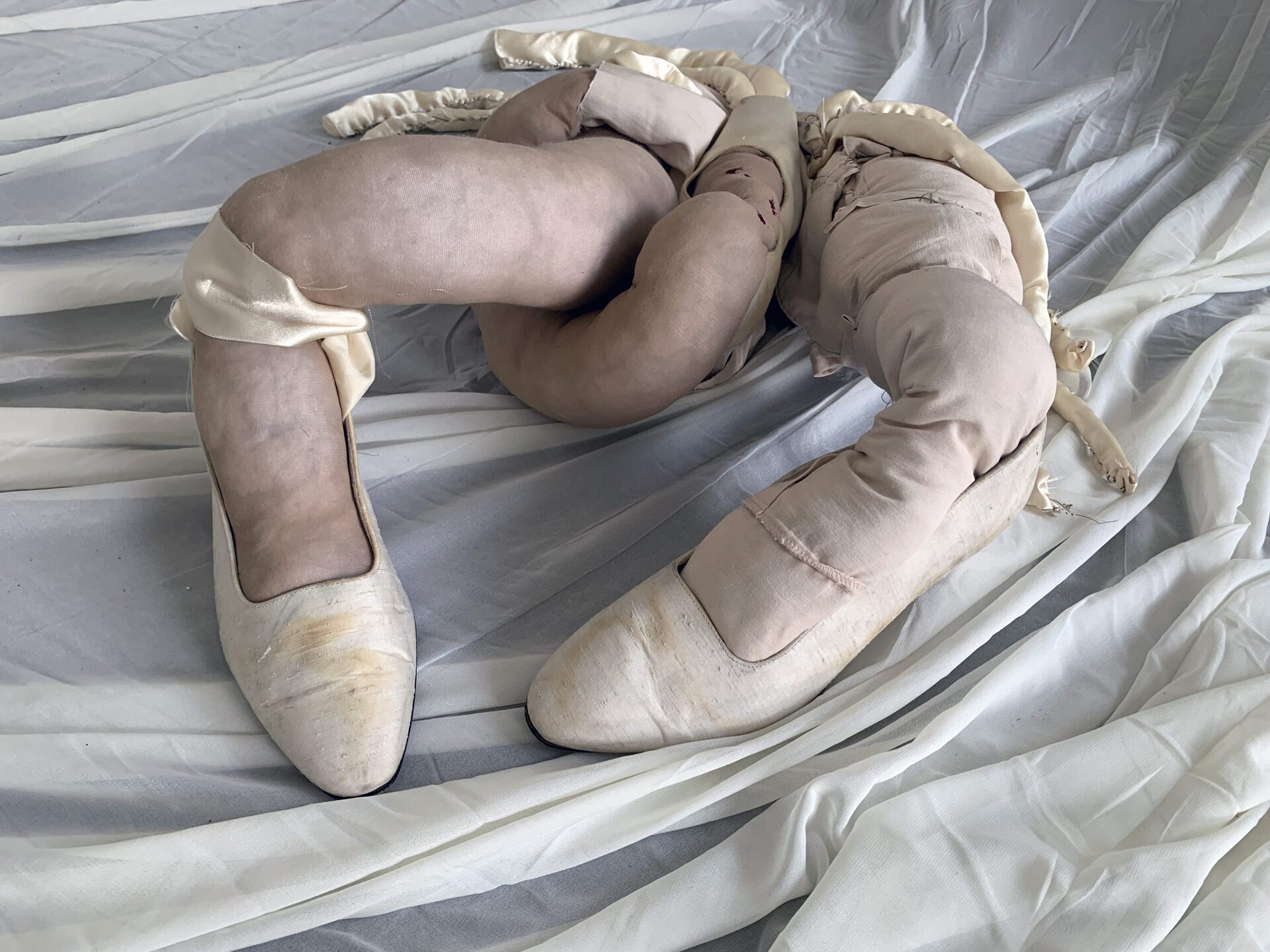 Lola, Untitled, 2022, nylon and artificial cotton, fabric, shoes