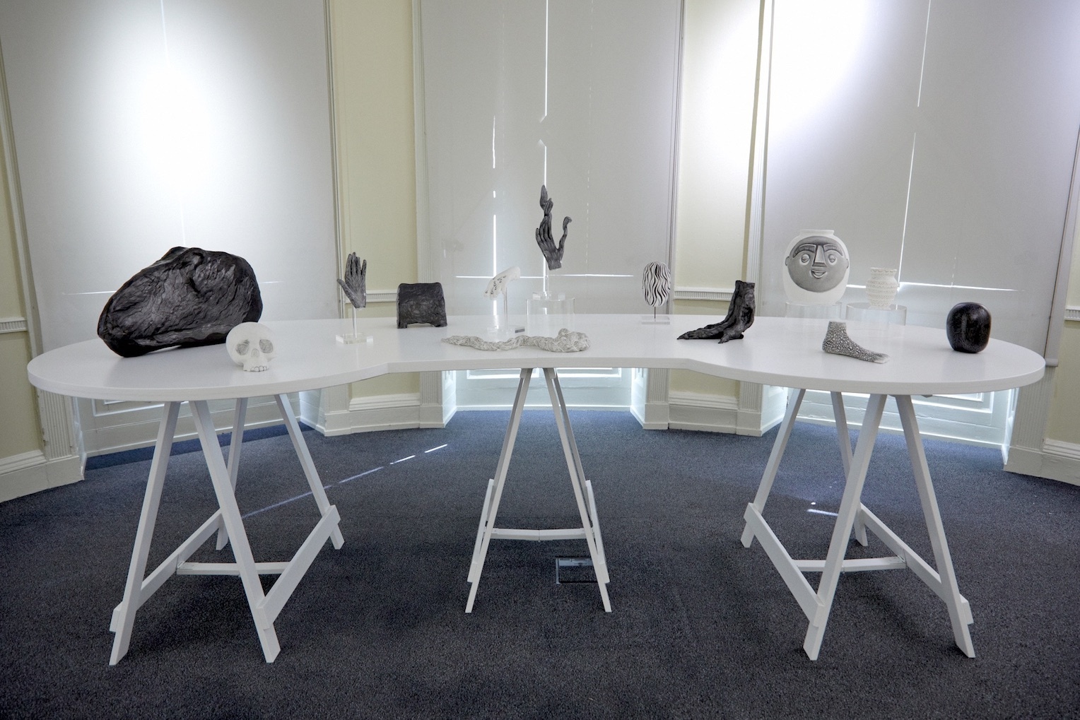 Marianne Walker, Kin, 2022, pencil and ink on sculpted paper clay various dimensions