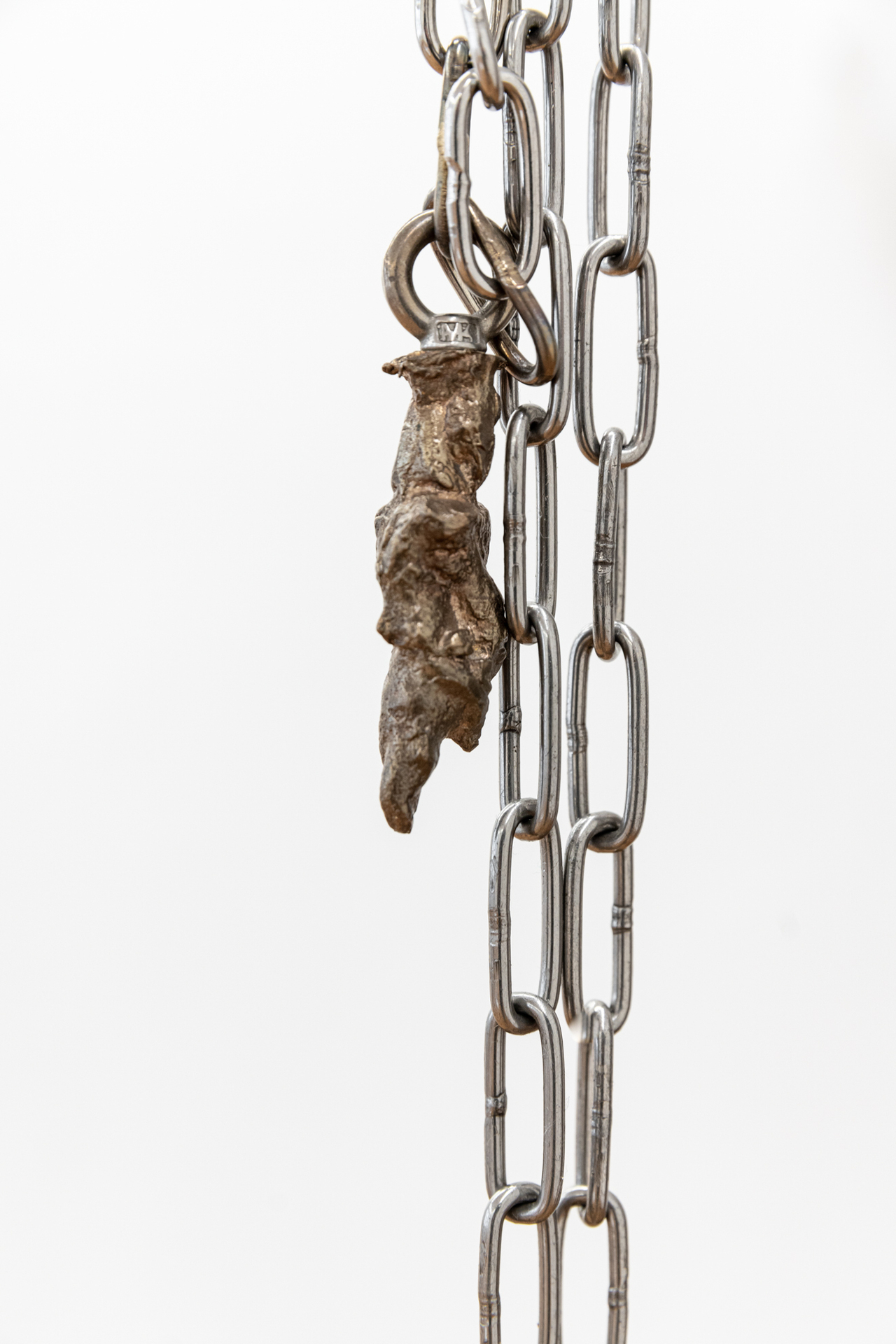 Laura Ní Fhlaibhín, "Amulets for an ecstatic afterlife", 2021, cast bronze marl spirits, stainless steel chain, stainless steel carabiners, ca. 8 x 2 x 2 cm each