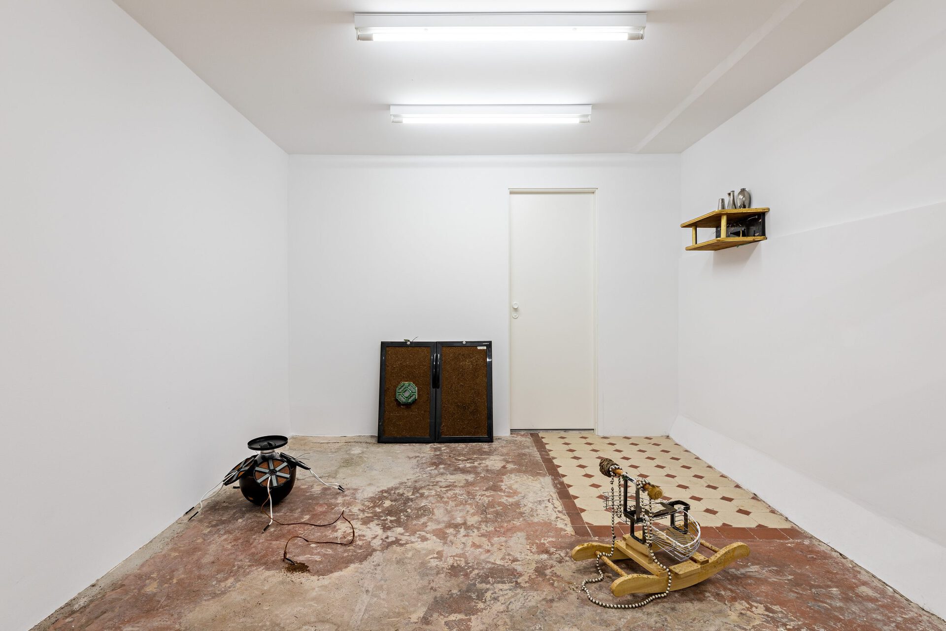 Michelle Chang Qin, Trade Gold for Stone, 2022, Metal, clay, cultiwool, table leg, wire, incense-holder, plastic, chainring, sealant, aquarium-sand, bassin, candlewick, thread, synthetic grapes, bike chain, acrylic, pipe, rope, granules, chair, gold glitter, paddle, fish net, pedal, fence, metal triangles Dimensions variable. Installation view.