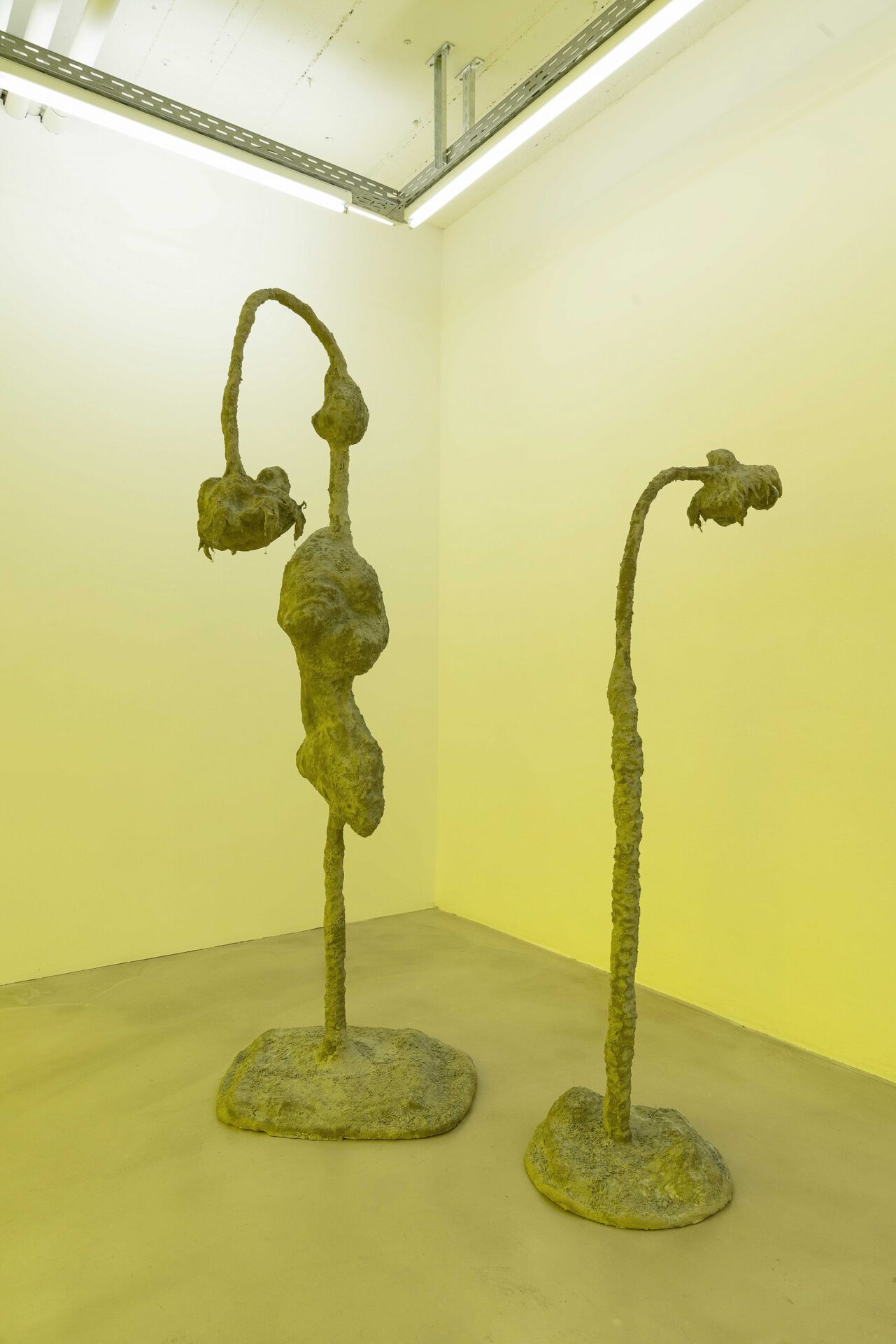James Lewis - Not just suffering, but all forms of consciousness - Left (Rewrite), 2022, wood, plaster bandage, concrete, steel, 213x80x95 cm. Right (Reaffirm), 2022, wood, plaster bandage, concrete, steel, 175x45x100 cm