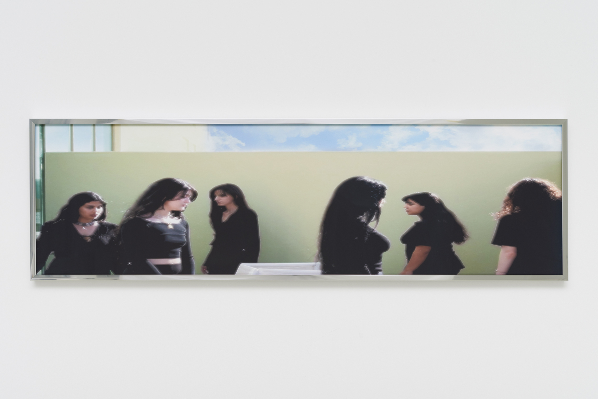 Shamiran Istifan, Eternal Return of the Same Girls, 2022, Giclée print, cotton rag paper, chrome frame, 30 x 100 cm. Courtesy the artist and Moarain House, London Photo: Theo Christelis