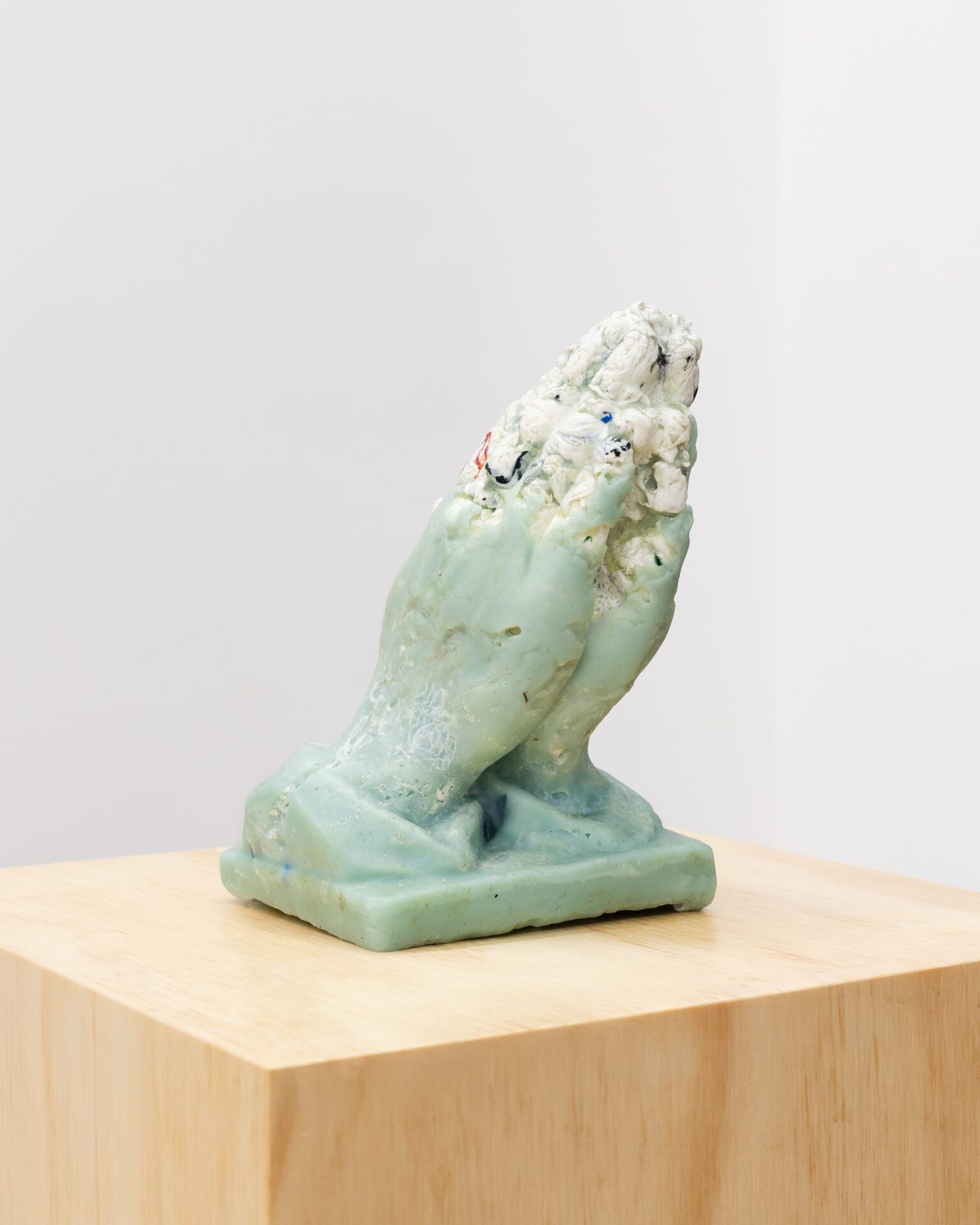 Lea Cetera Prayer Hands (No.2), 2020, Wax, HDPE and LPDE plastic bodega bags, 16.5 x 10.2 x 8.9 cm.