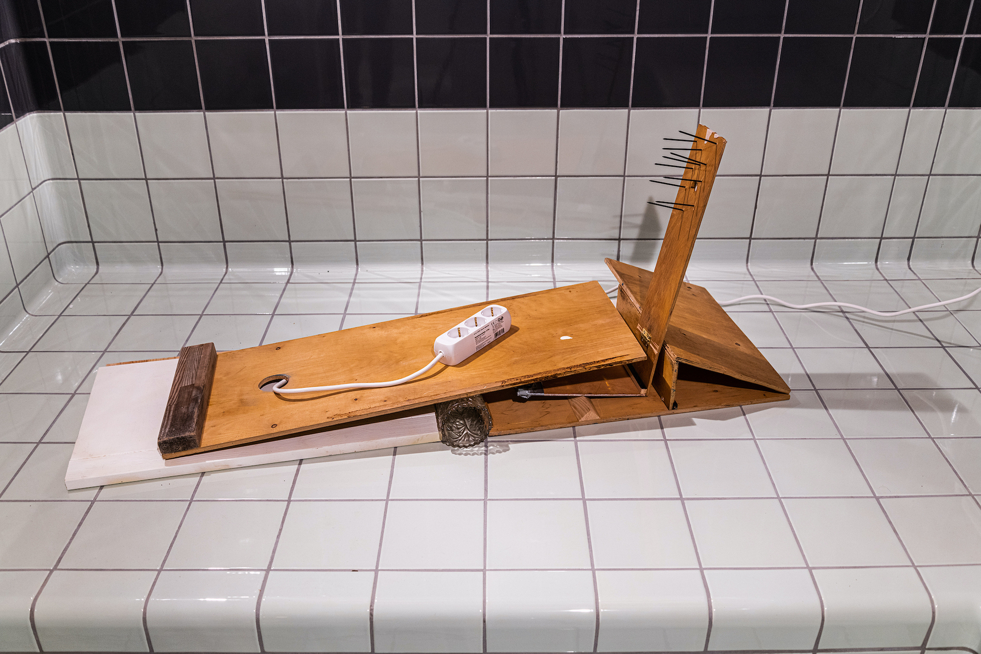 Charger, 2022 wood, iron, glass, brass, duct tape, varnish, extension board 110 x 47 x 55 cm courtesy: the artist, LIAF, Case Chiuse by Paola Clerico and Monitor, Rome, Lisbon, Pereto Ph. Courtesy: Claudia Rossini