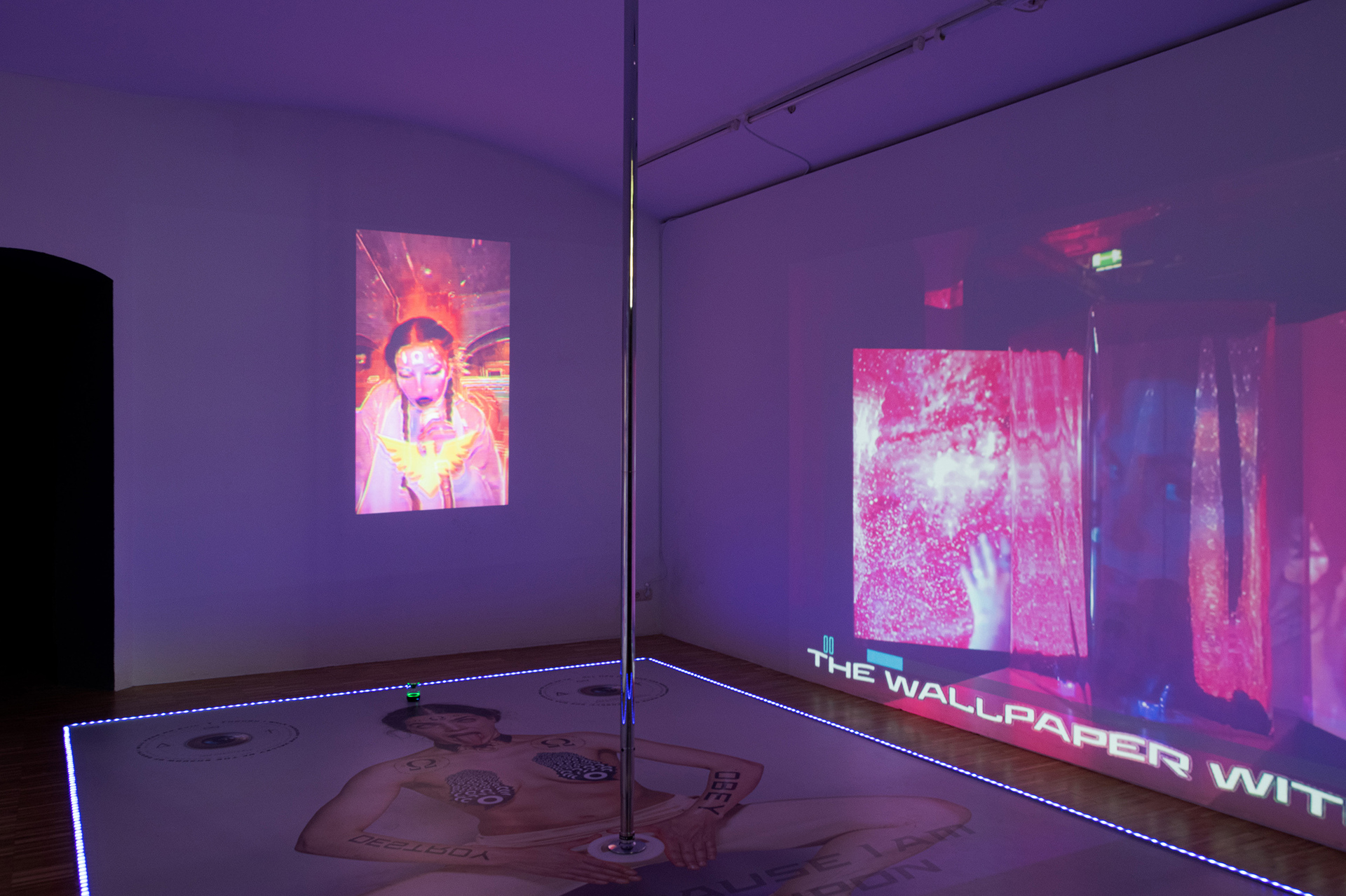 Denise Blickhan, Medusa X (Iconoclasms), 2021/2022, Performance and mixed media installation with plastic curtain, dance pole, vinyl floor, video, sound, Dimensions variable