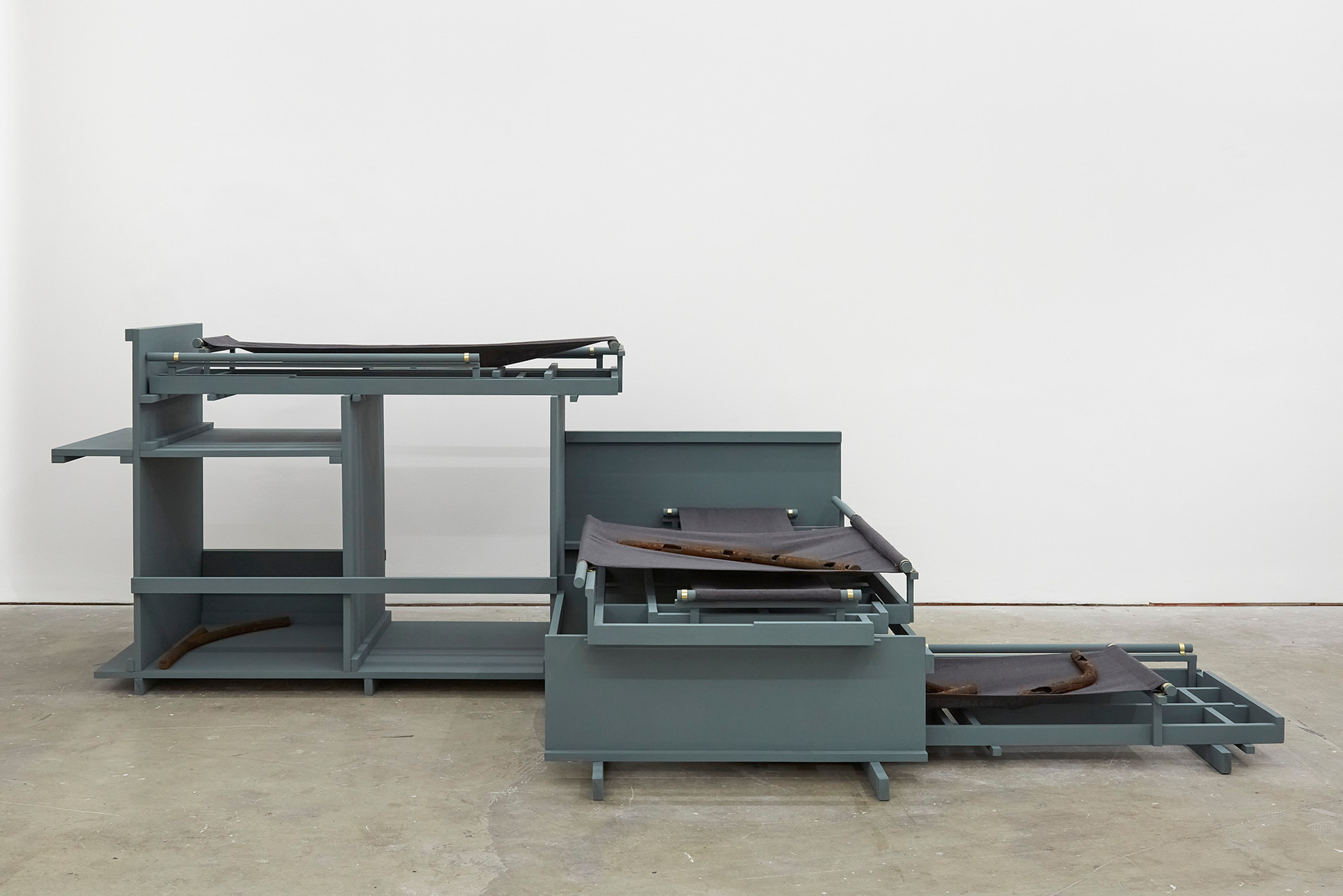 Claire Baily, Precious Cargo, 2022, Plywood, brass, household paint, jesmonite, mild steel, iron powder, linen, 93 x 272 x 140 cm