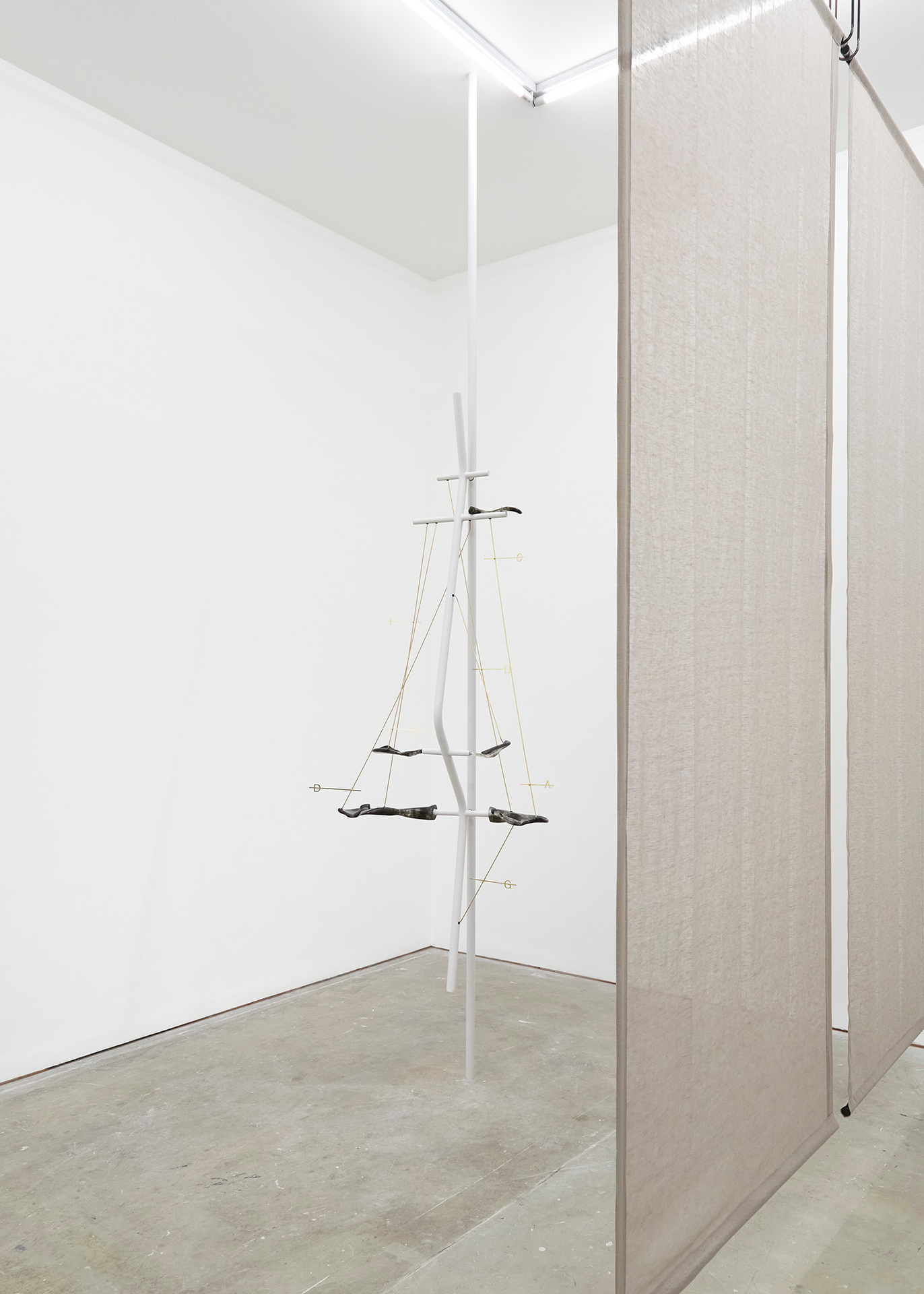 Claire Baily, You aren’t who you thought you were, 2022, Epoxy resin, lichen, ink, charcoal, brass, mild steel, lacquer, 360 x 90 x 42 cm