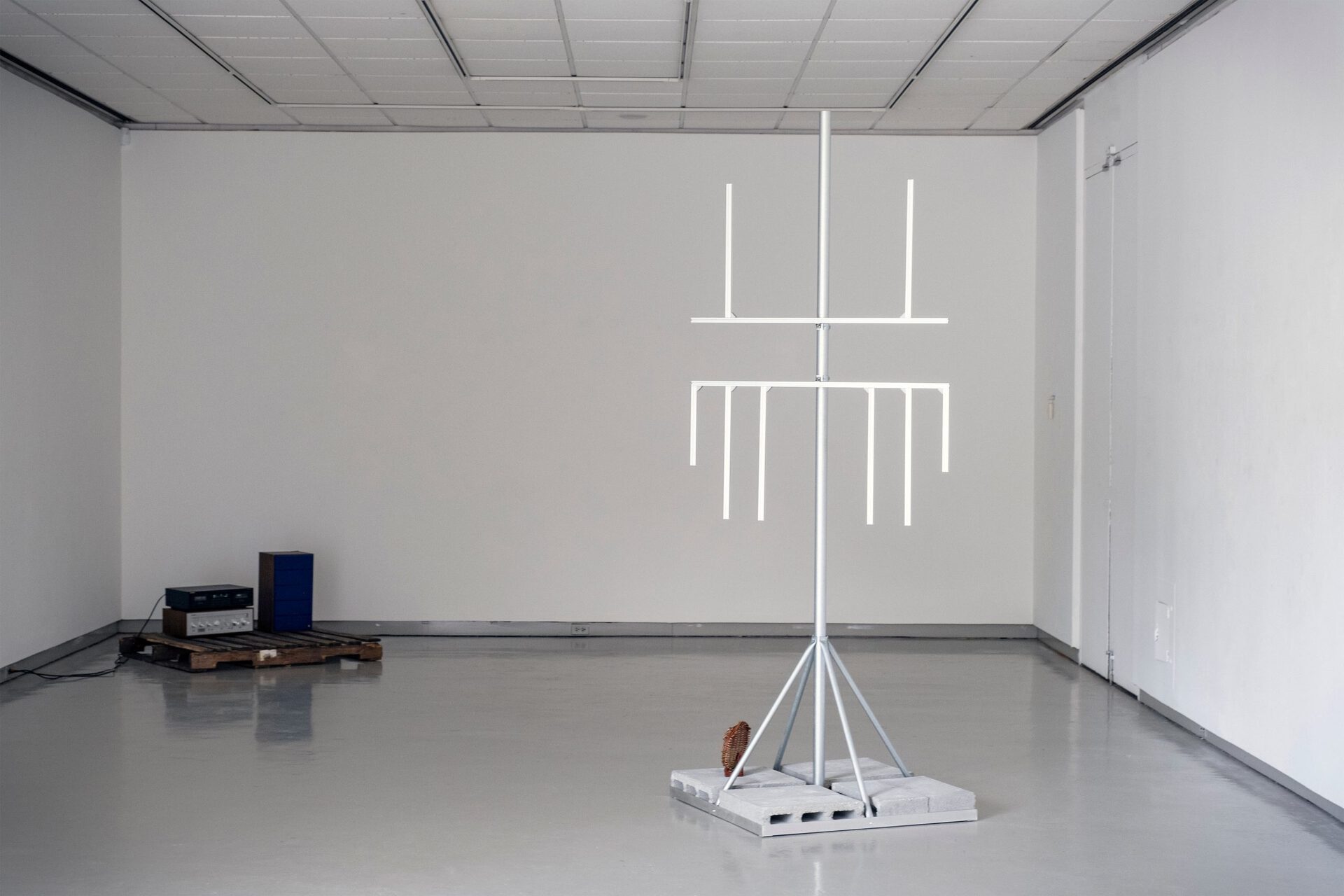 Jerome Sicard, CMFMFA, 2022, Aluminum, cinder blocks, steel, willow, zinc, 36” x 8’ 10” x 36”.